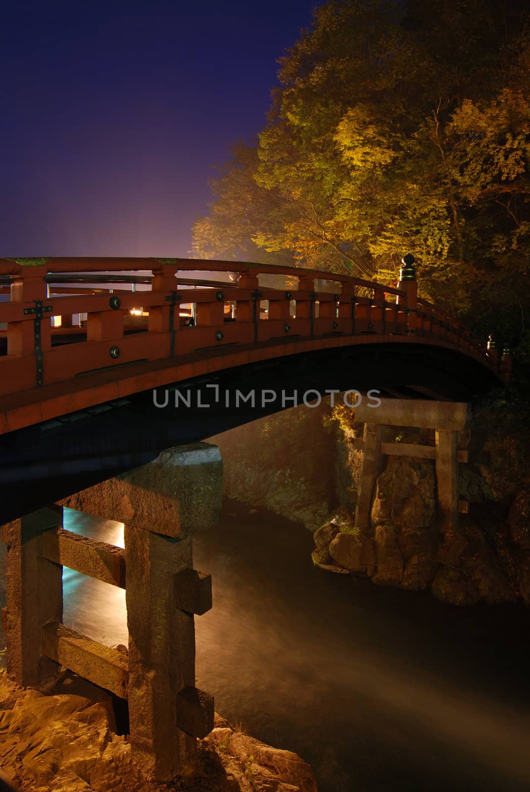 sacred Japanese red bridge at night, Shinkyo Bridge, Nikko Japan