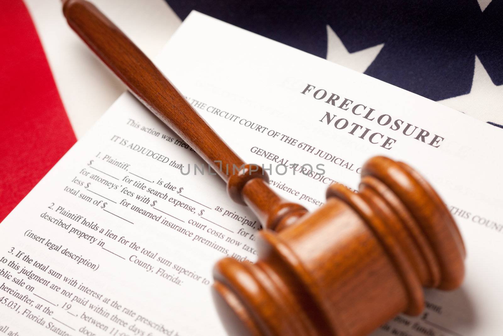 Gavel, American Flag and Foreclosure Notice with Selective Focus.