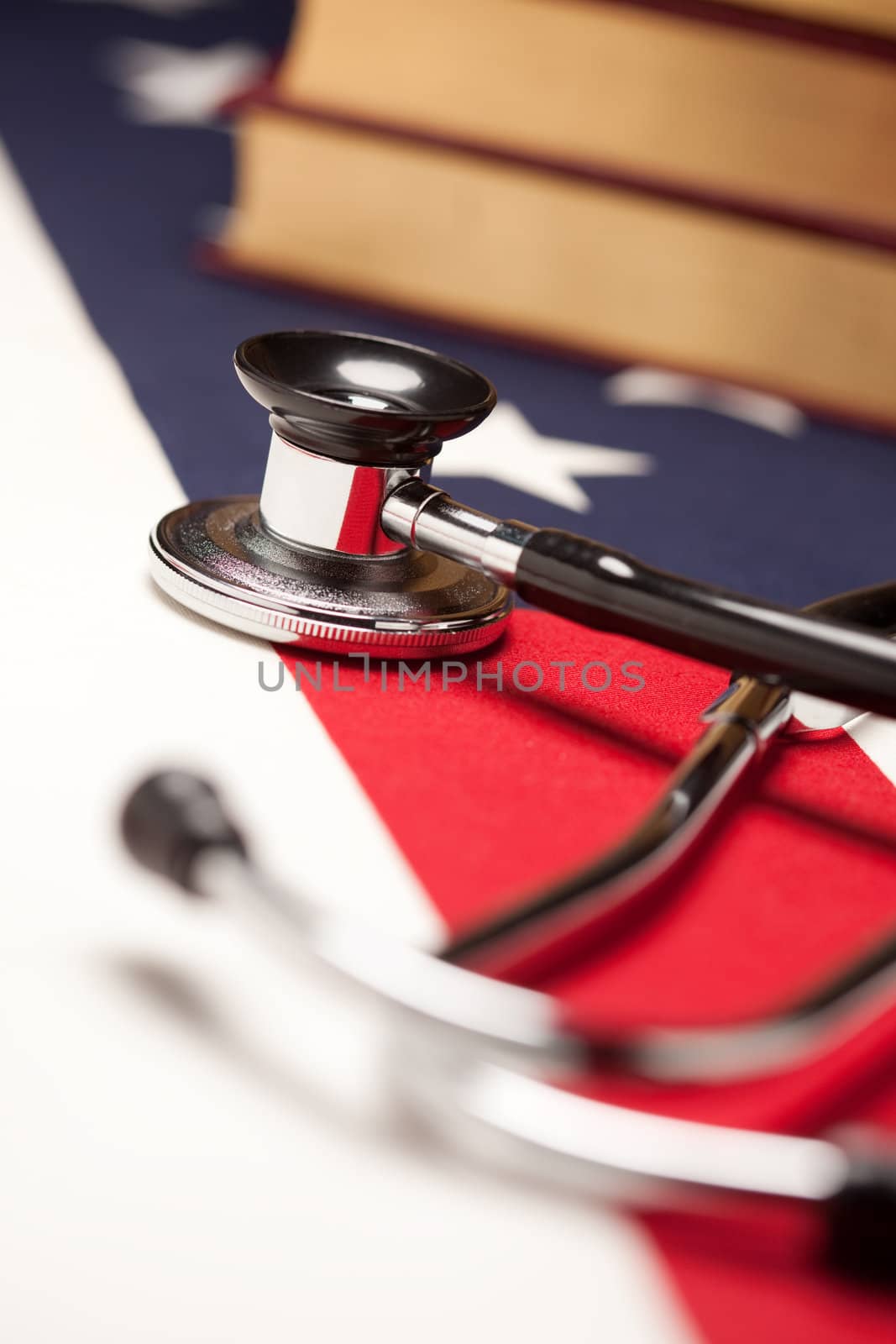 Stethoscope and Books on American Flag by Feverpitched