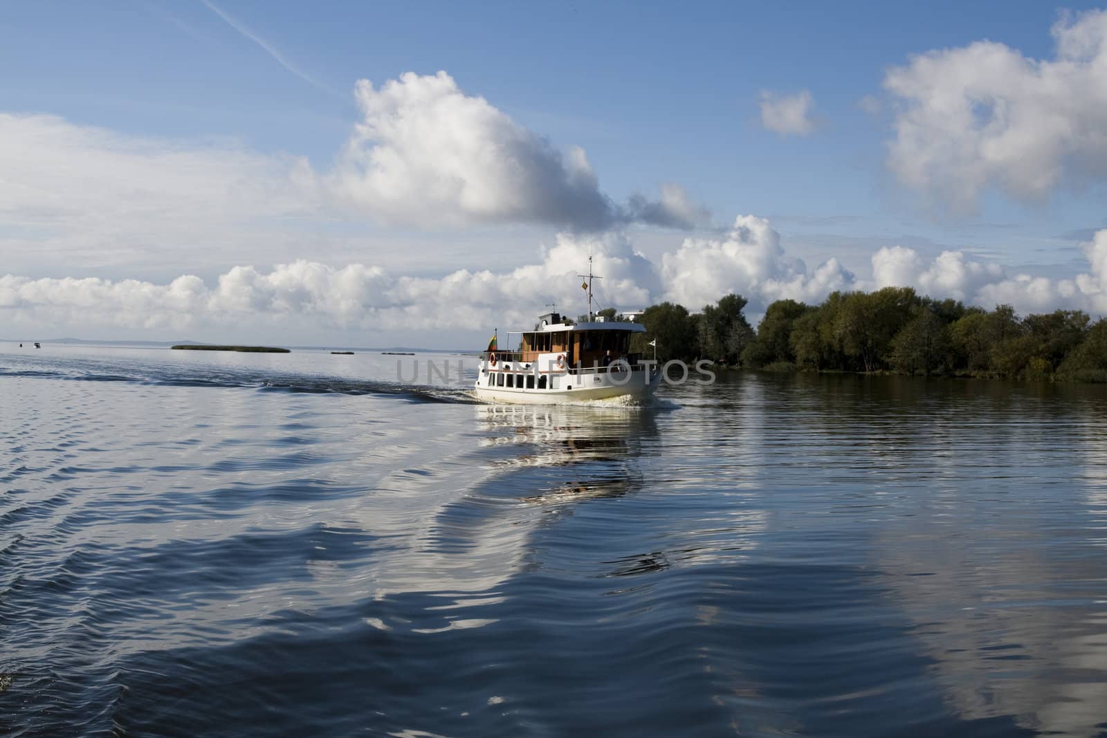 River boat in Nemunas at sunny autumn day. Lithuania