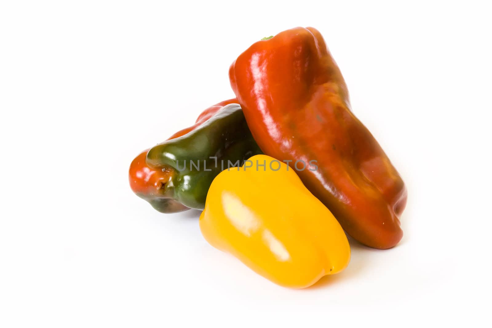 Some different paprika fruits on a white background