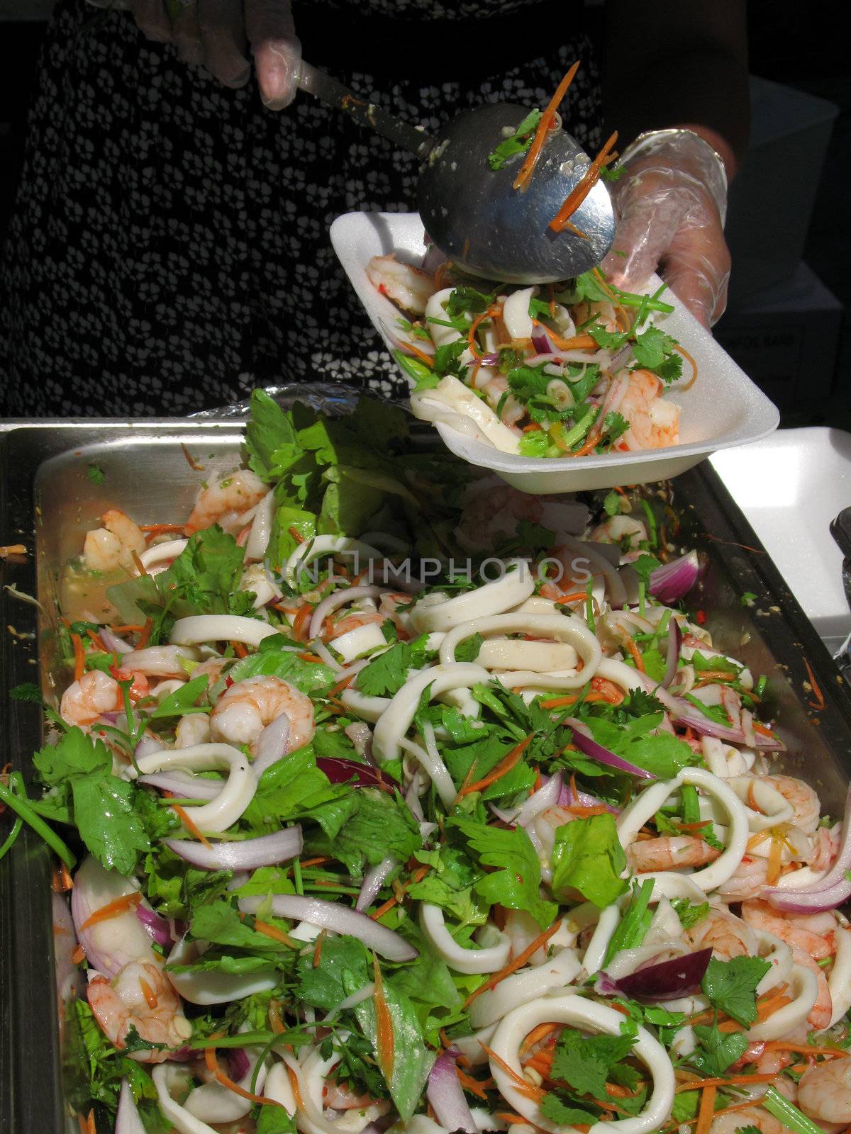 Caterer serves up seafood salad