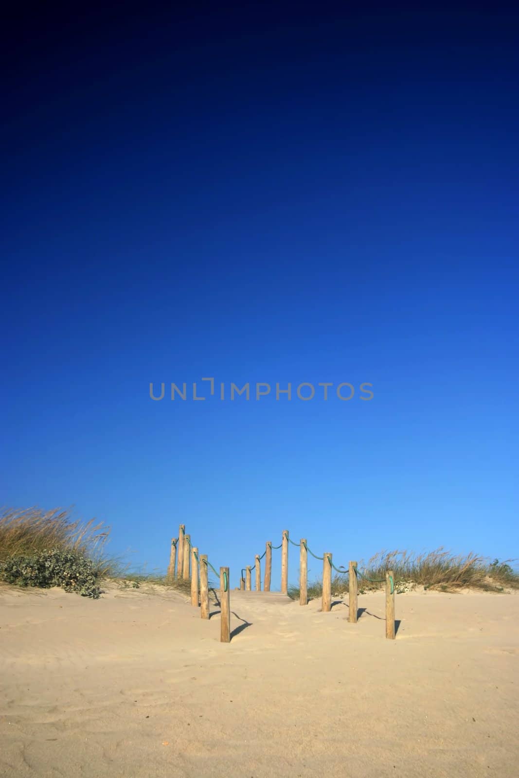 Beach scene with deep blue sky