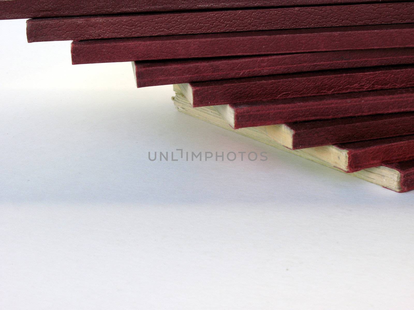 Pile of books against isolated background