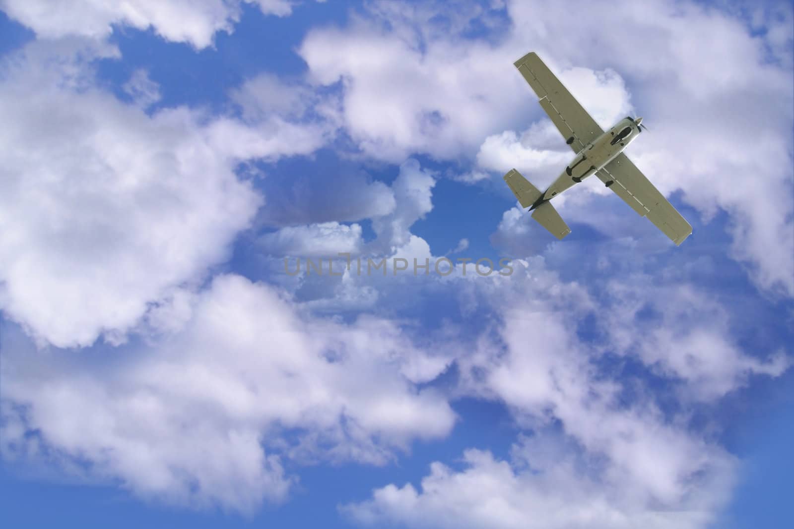 Small private airplane flying overhead