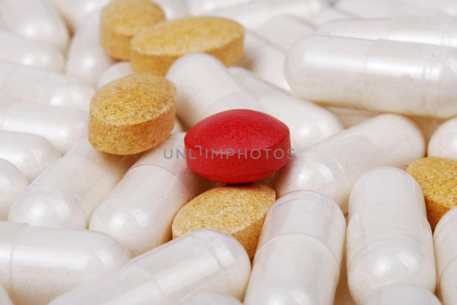 Pills and capsules laying together