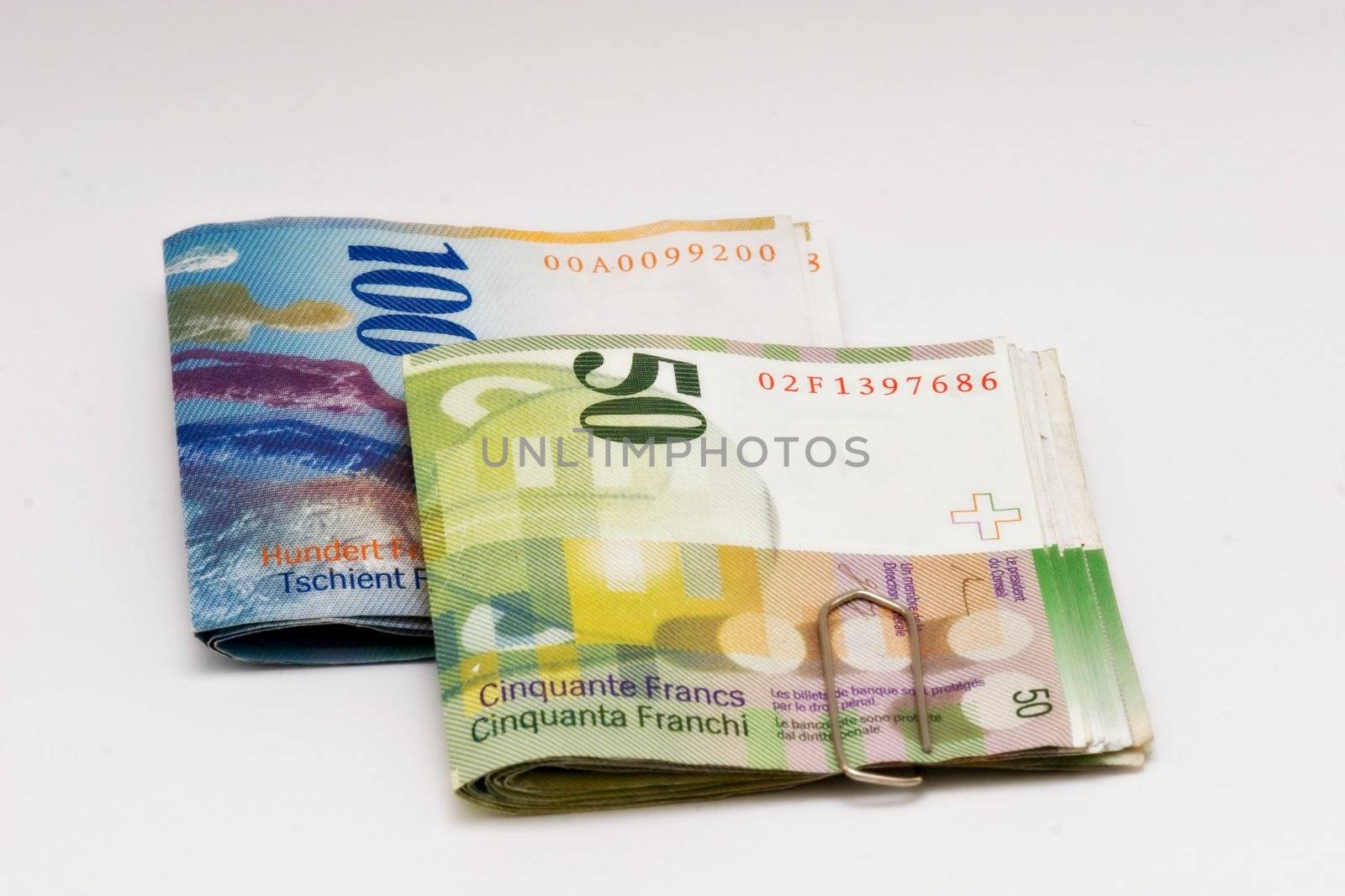 100 and 50 franc swiss bills isolated on white background