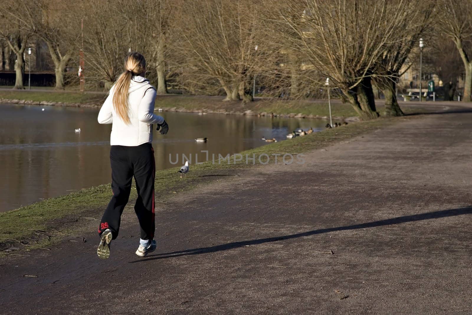 Girl running on park.