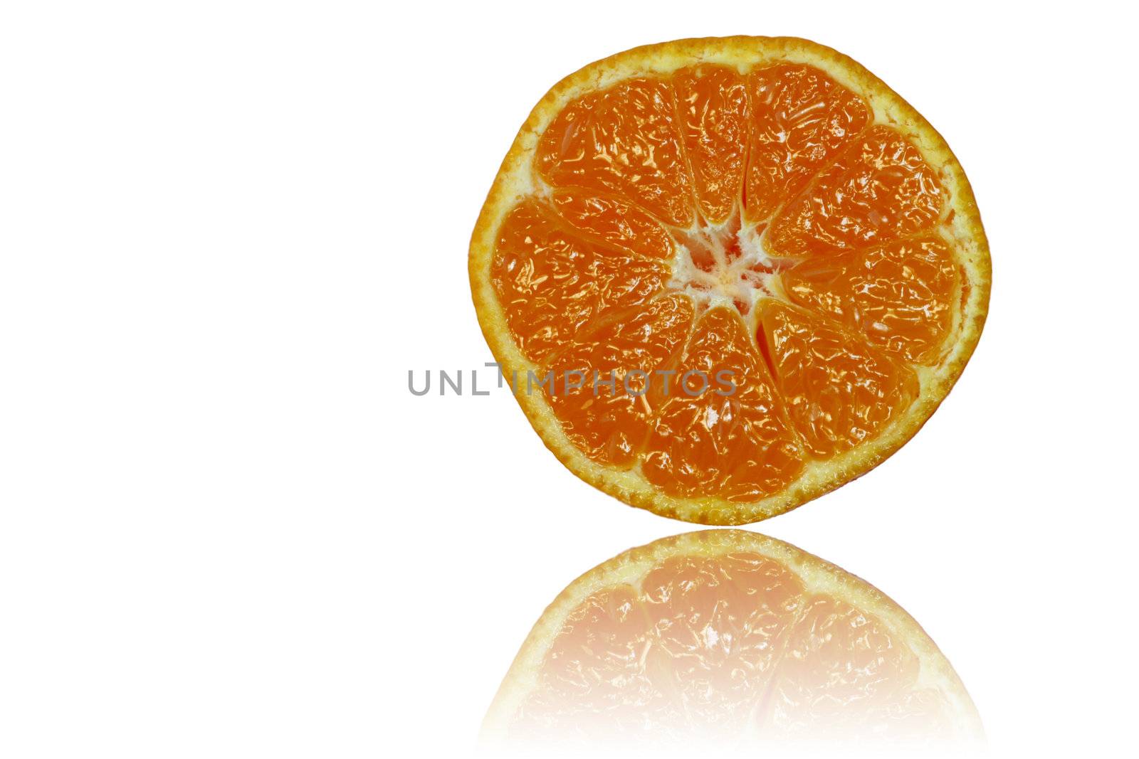 Slice Orange on Reflective Background by sacatani