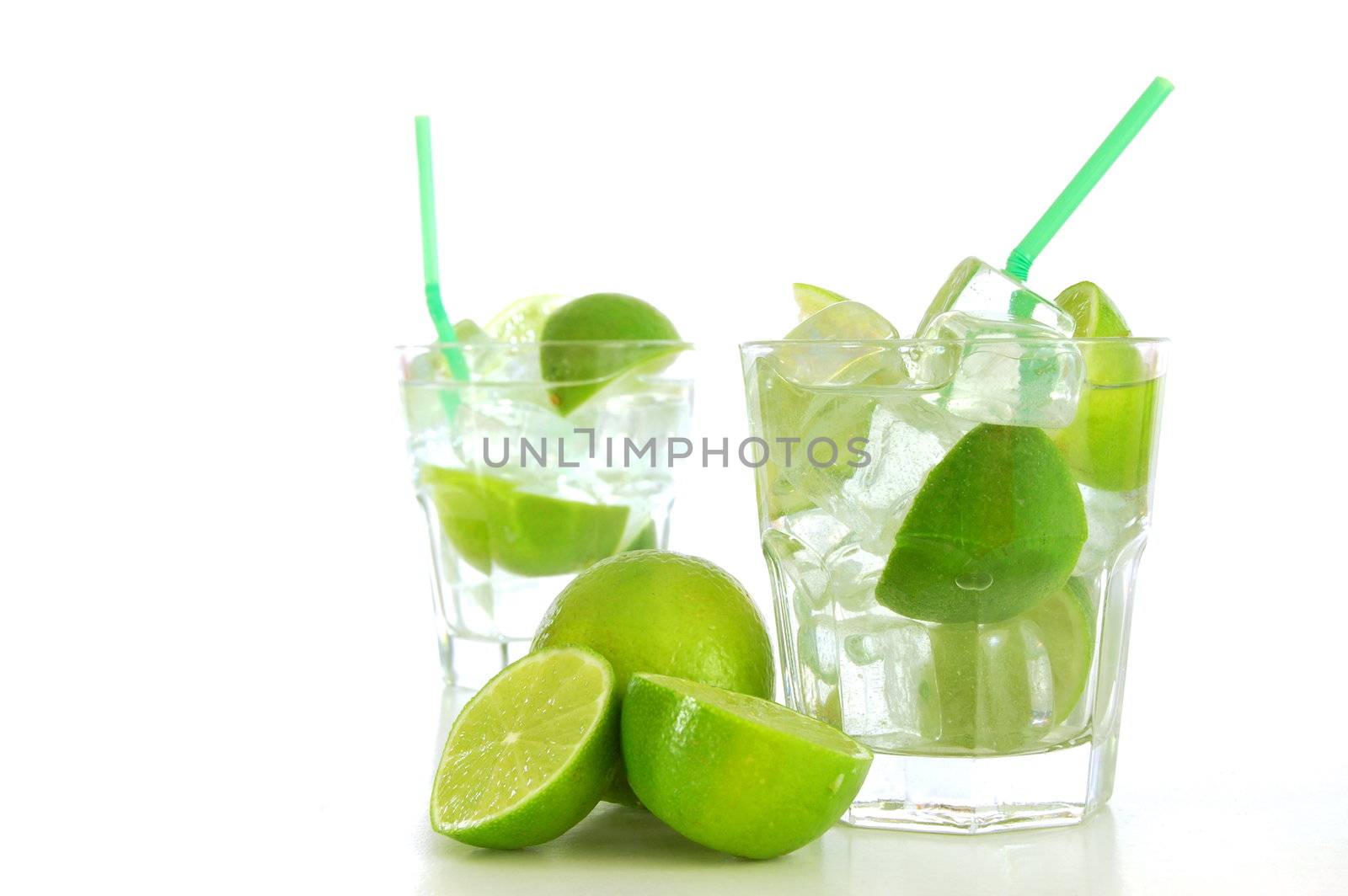 cool green Caipirinha cocktail drink with lime