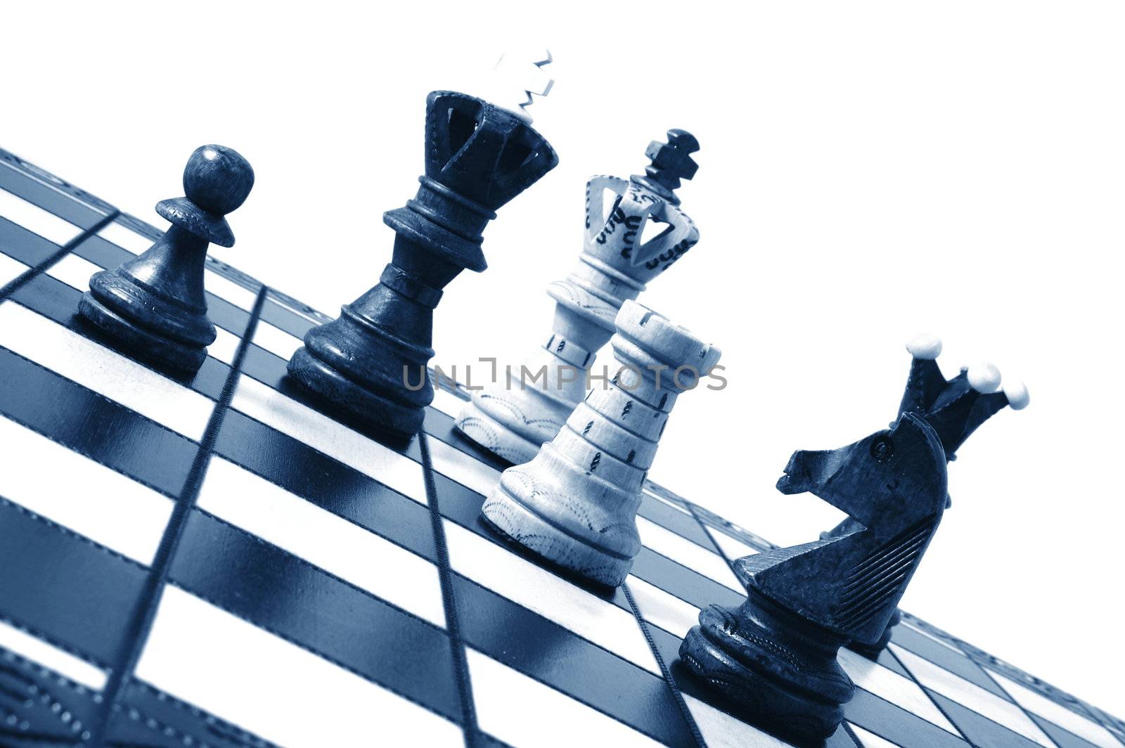 chess pieces on a chess board showing concept for strategic business