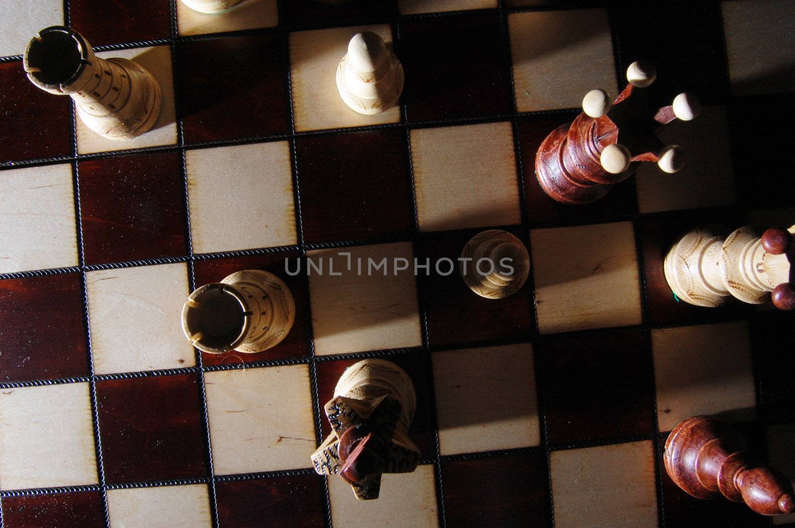 chess pieces on chess board showing power and success