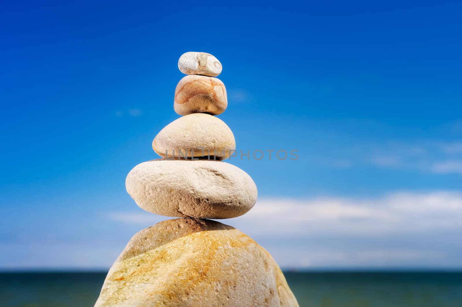 Pile of the light stone on the shore