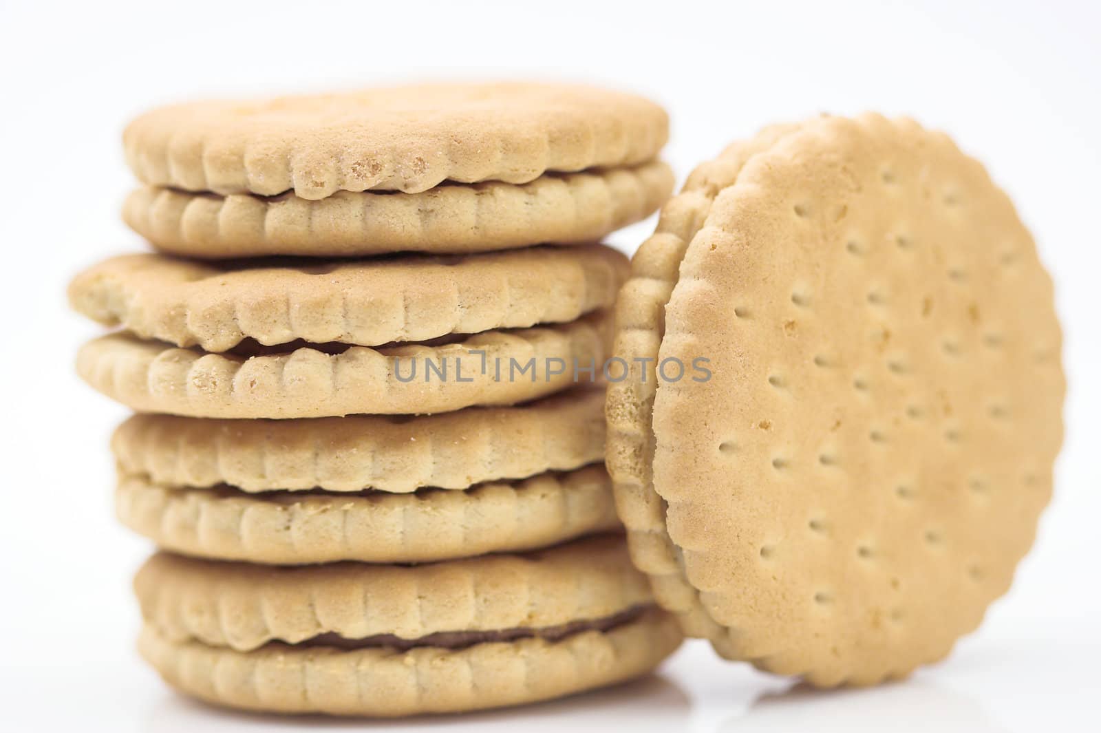 Stack of cookies close up by alexkosev