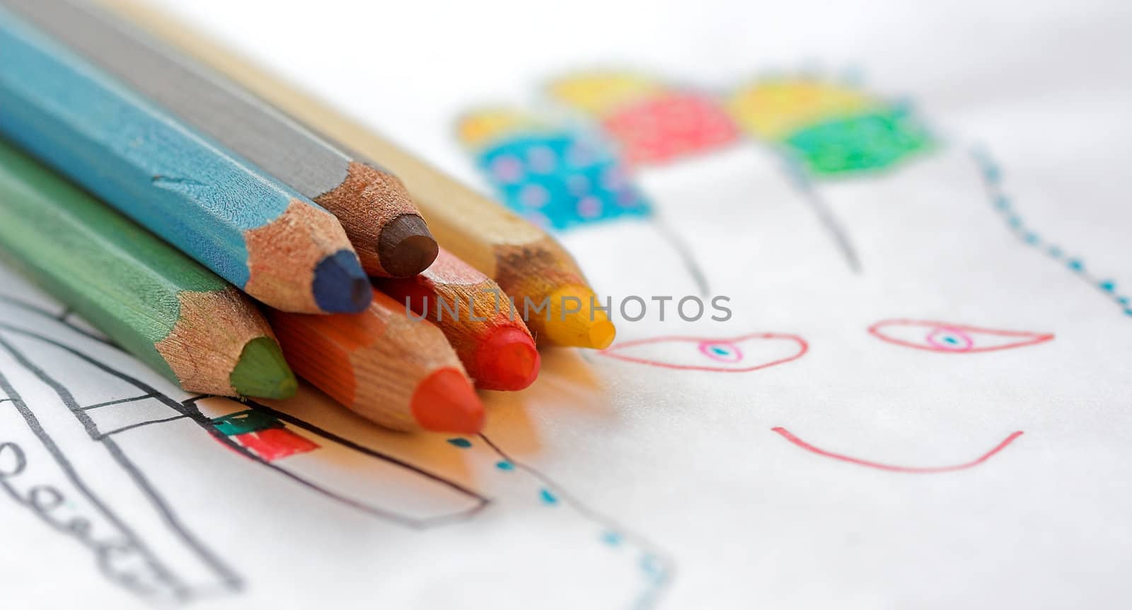 Stack of color crayons close up