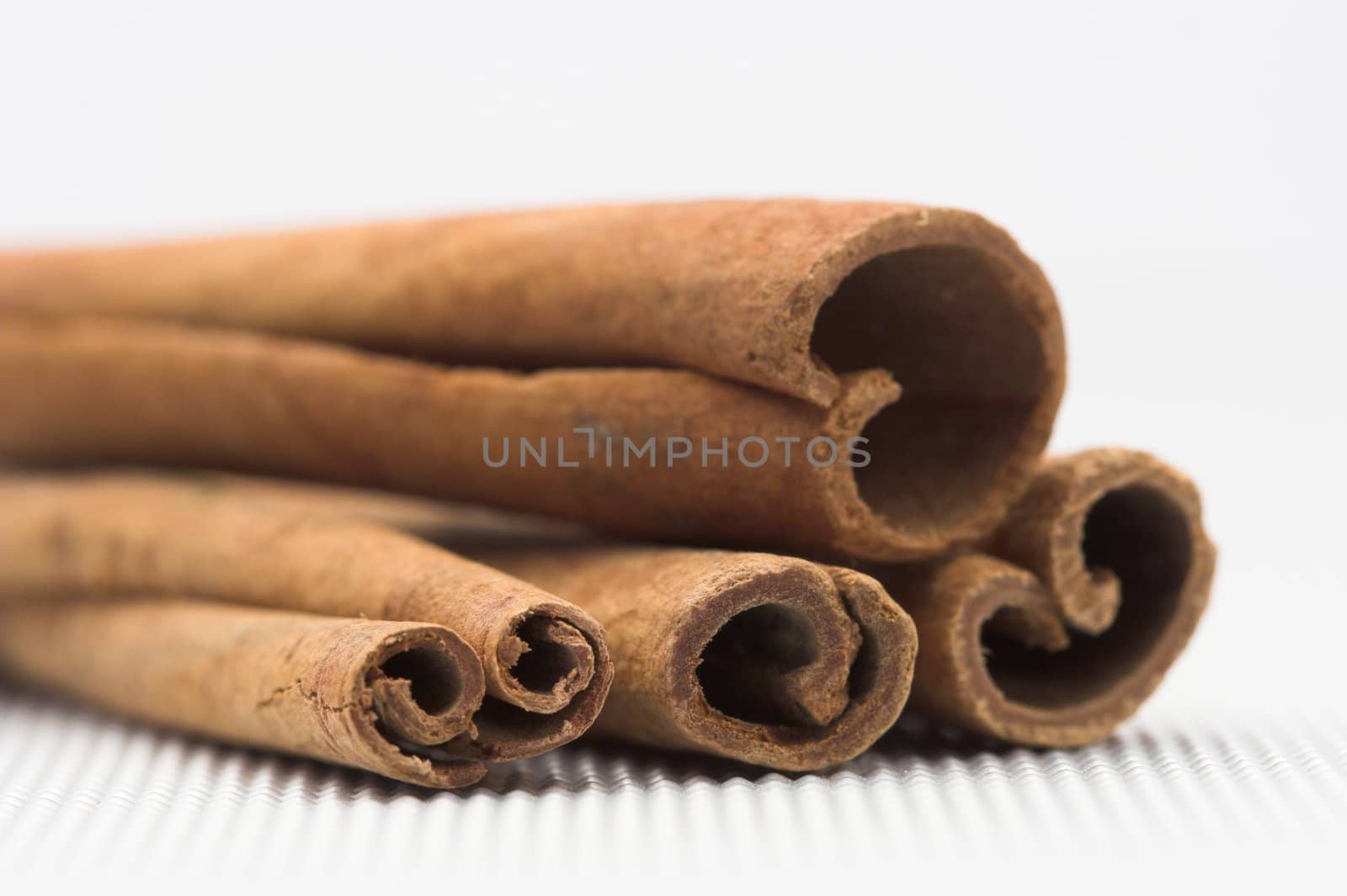 Close up of cinnamon sticks, shallow Dof