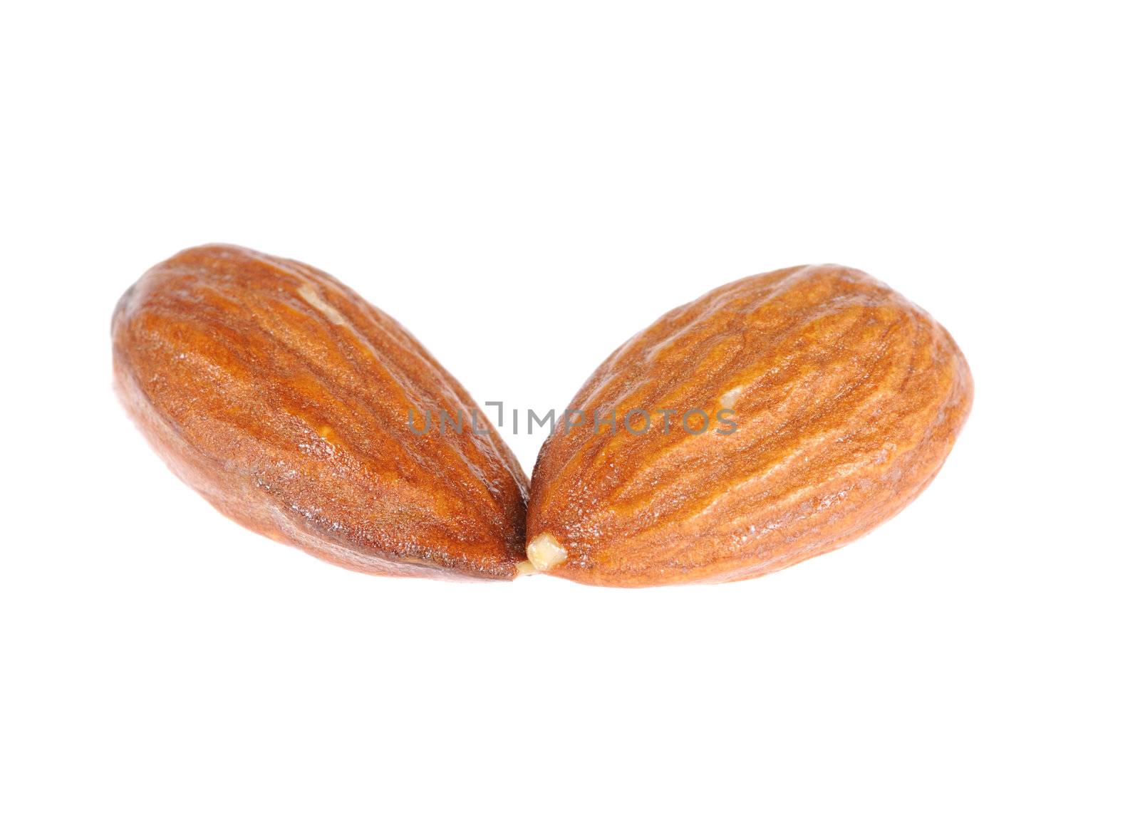 ripe kernel almond isolated on white background