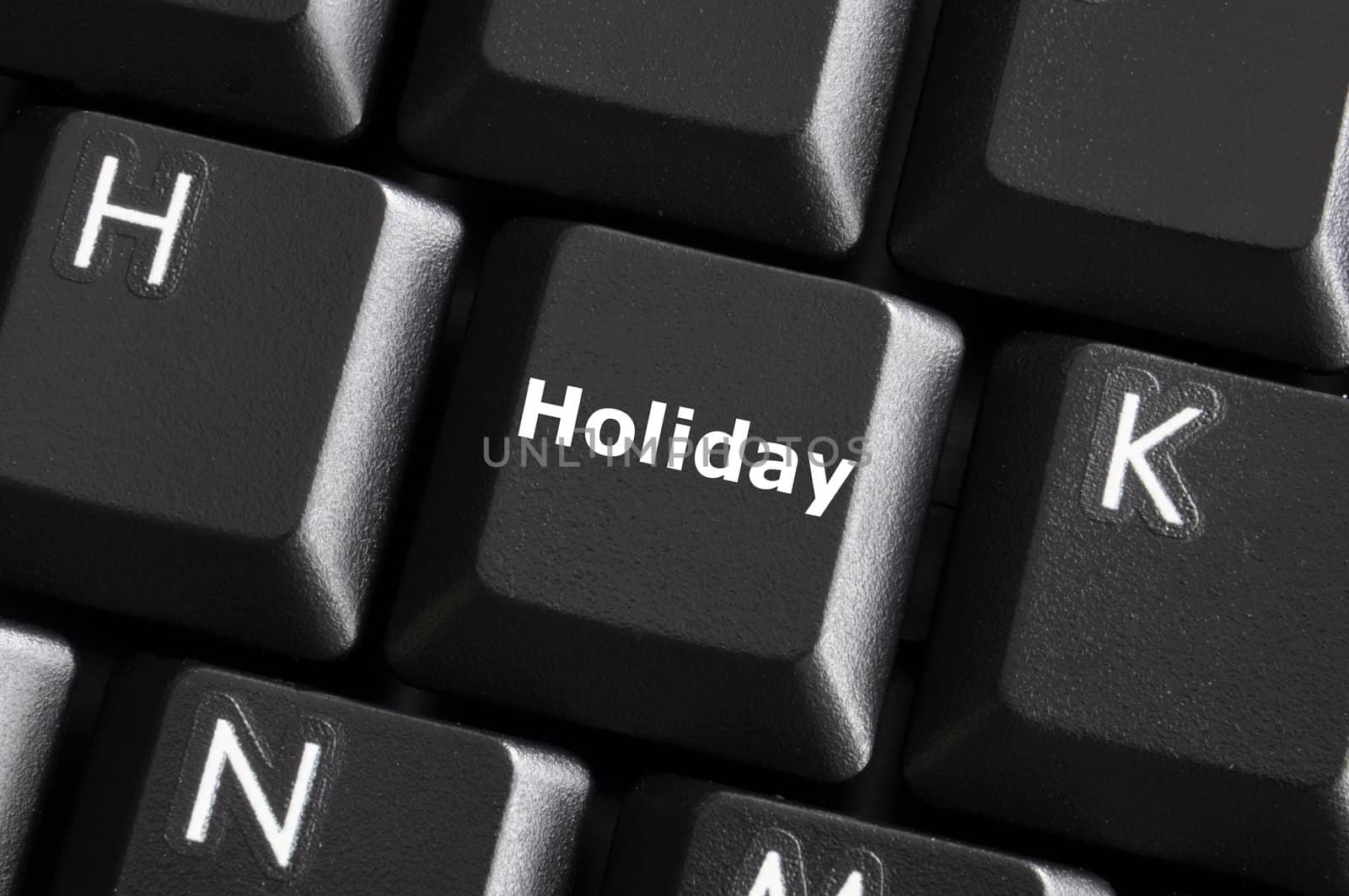 holiday concept with button on computer keyboard