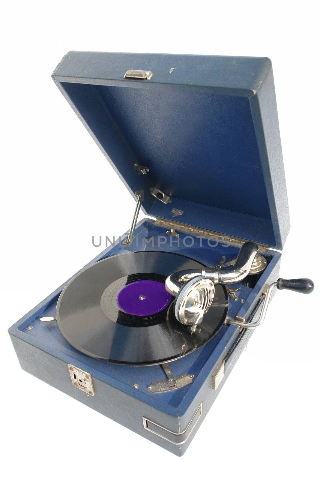  The device for playing phonograph records over white background.                            