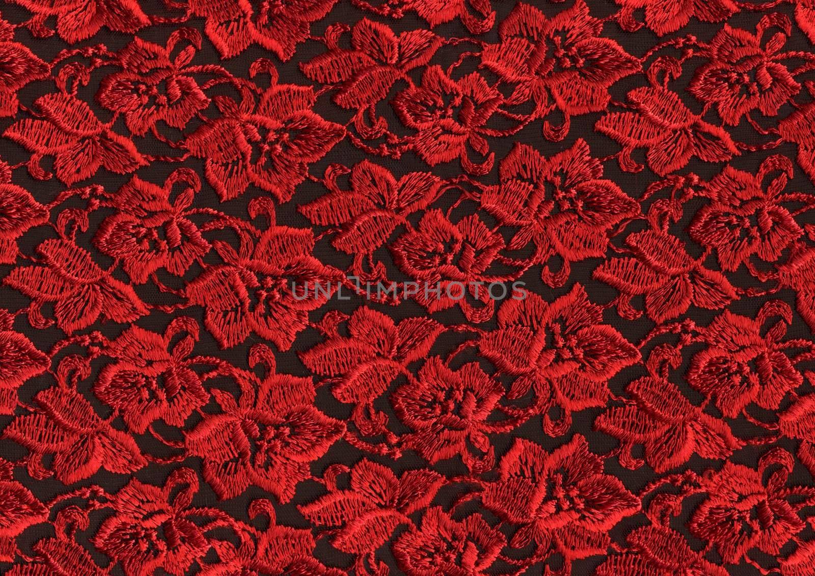 red  lace on black background                             