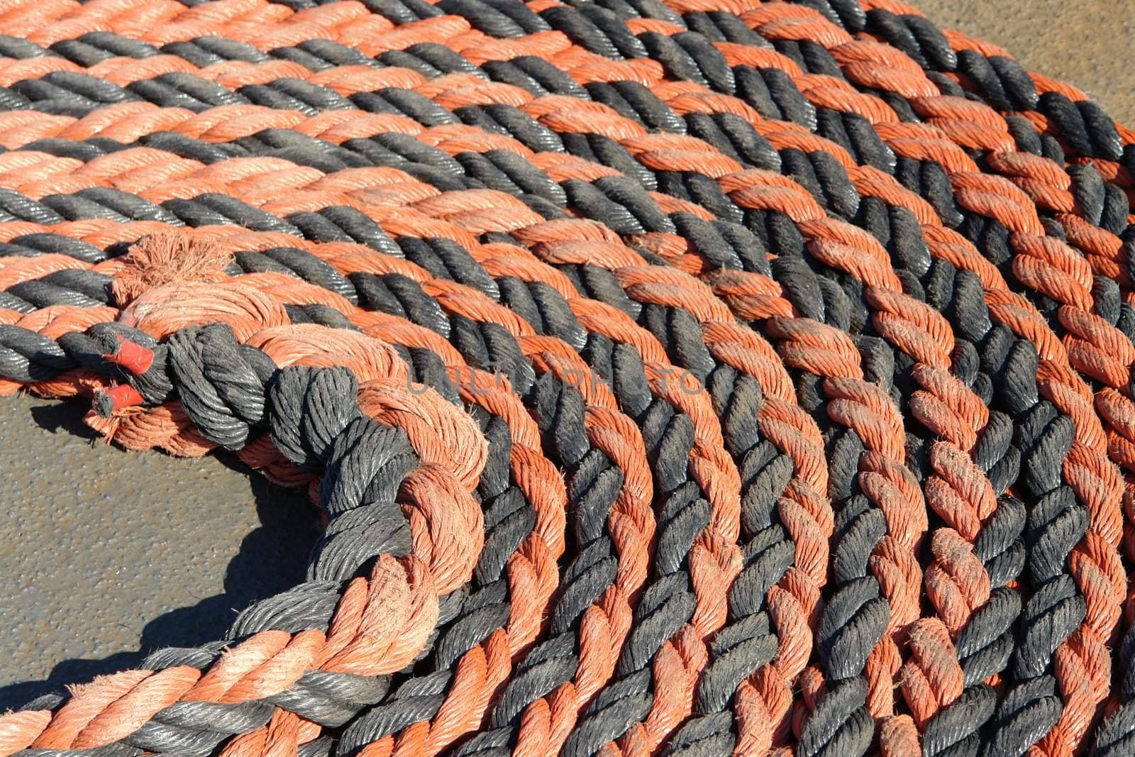 A rope stored on deck of warship                           