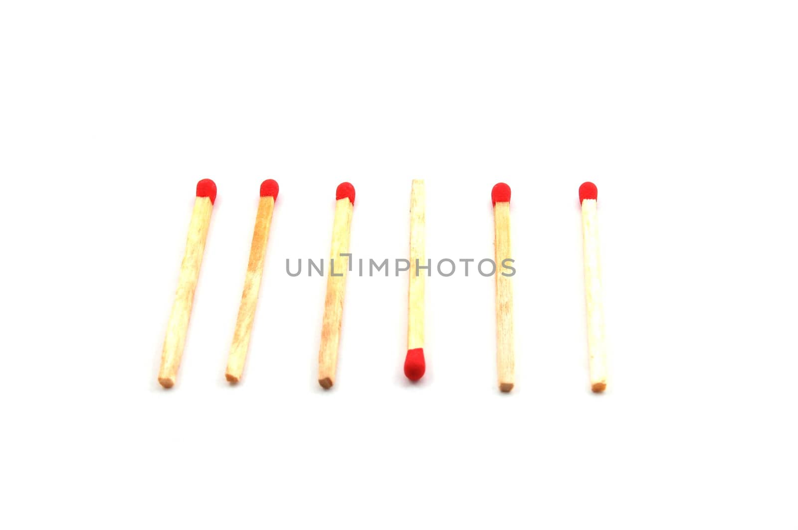 Some red matches isolated on a white background.