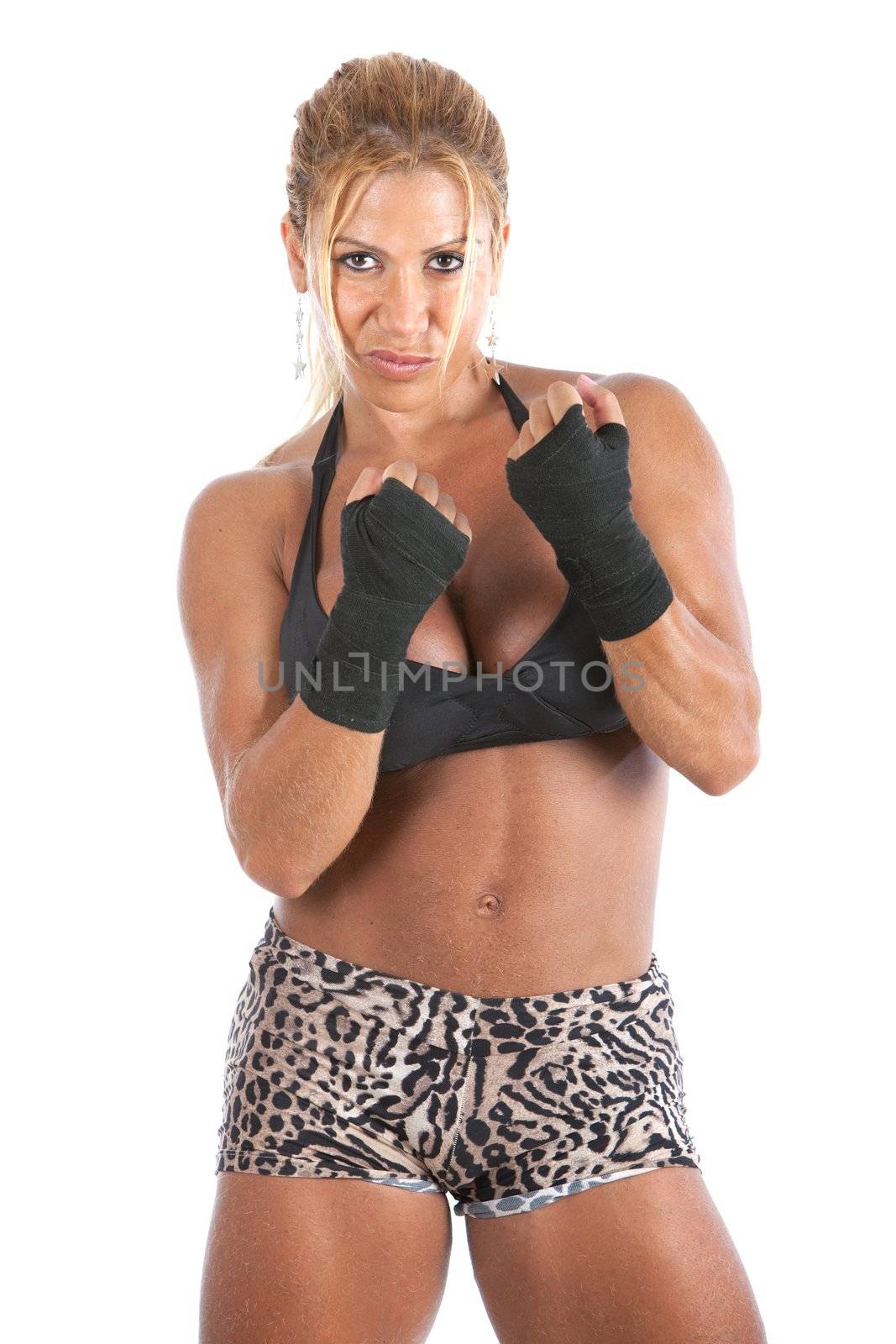 A blonde female bodybuilder isolated on a white background.   Image is part of a series.
