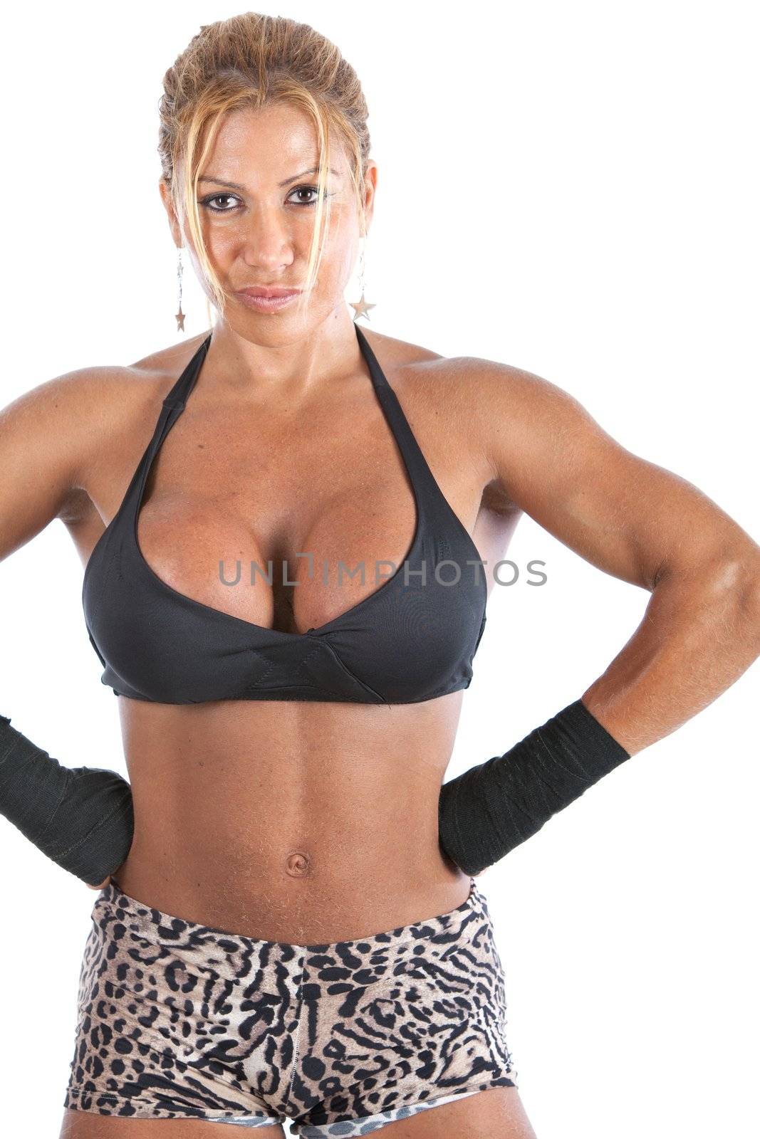 A blonde female bodybuilder isolated on a white background.   Image is part of a series.