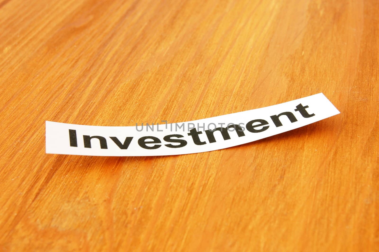 word investment written on paper and space for text message