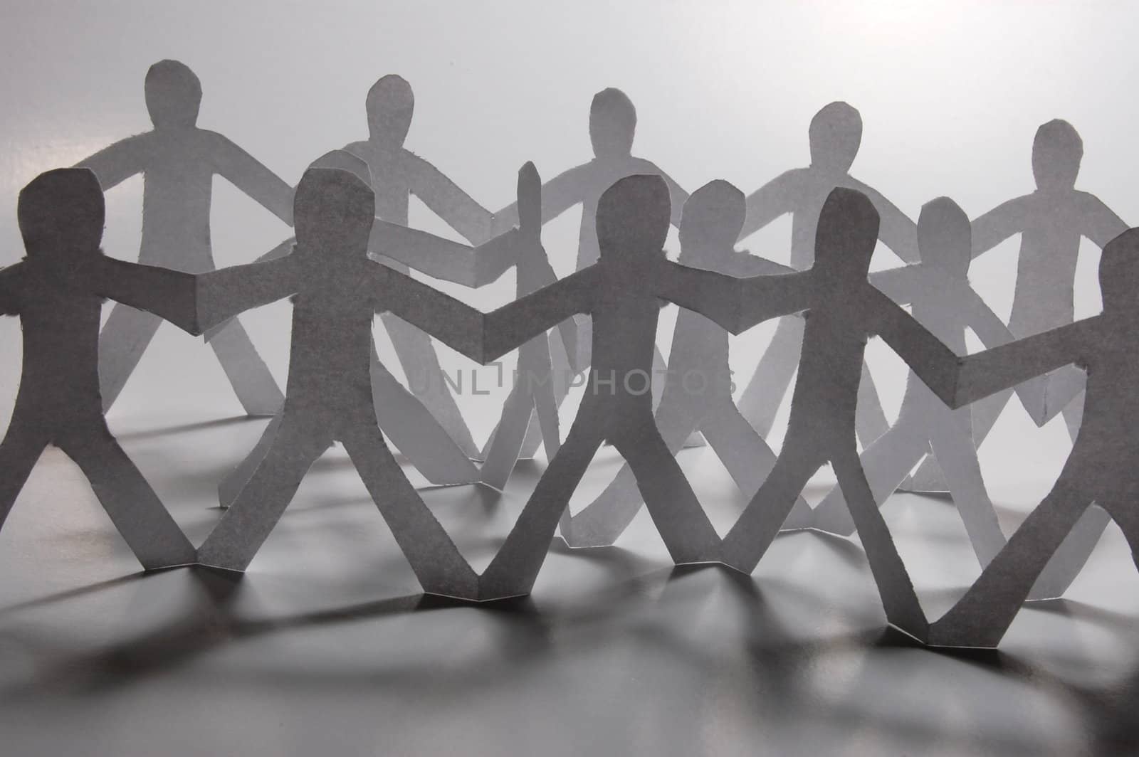 paper people doing teamwork in their business
