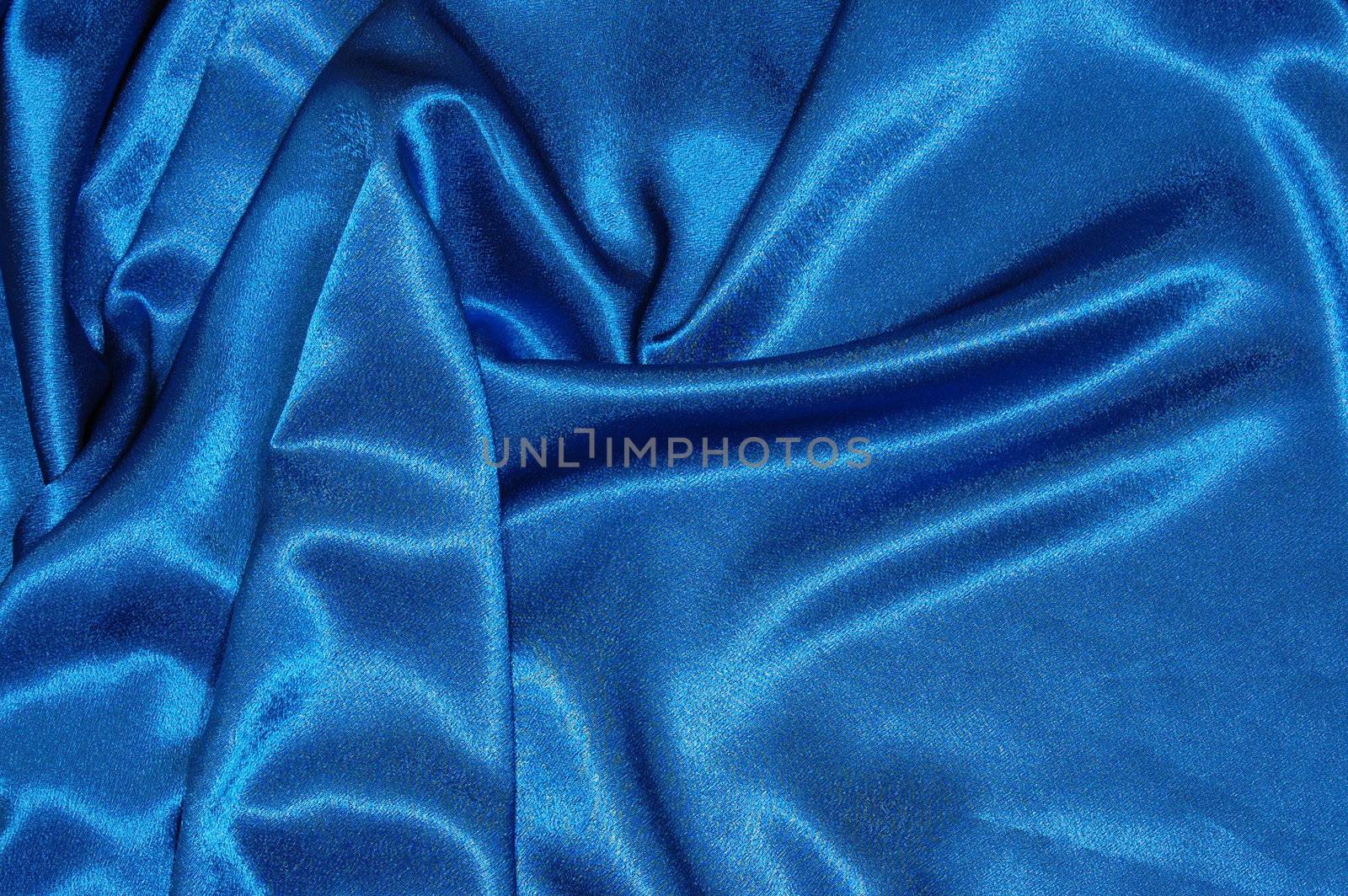 blue satin or silk background with textile texture