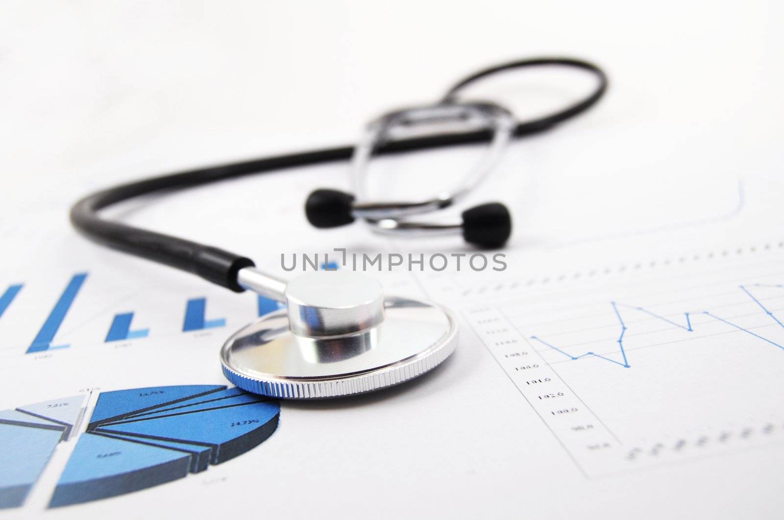 health and medical concept with stethoscope on diagram