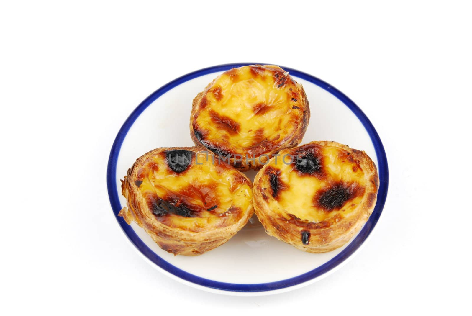 delicious pasteis de nata, typical pasty from Lisbon - Portugal (isolated on white background)