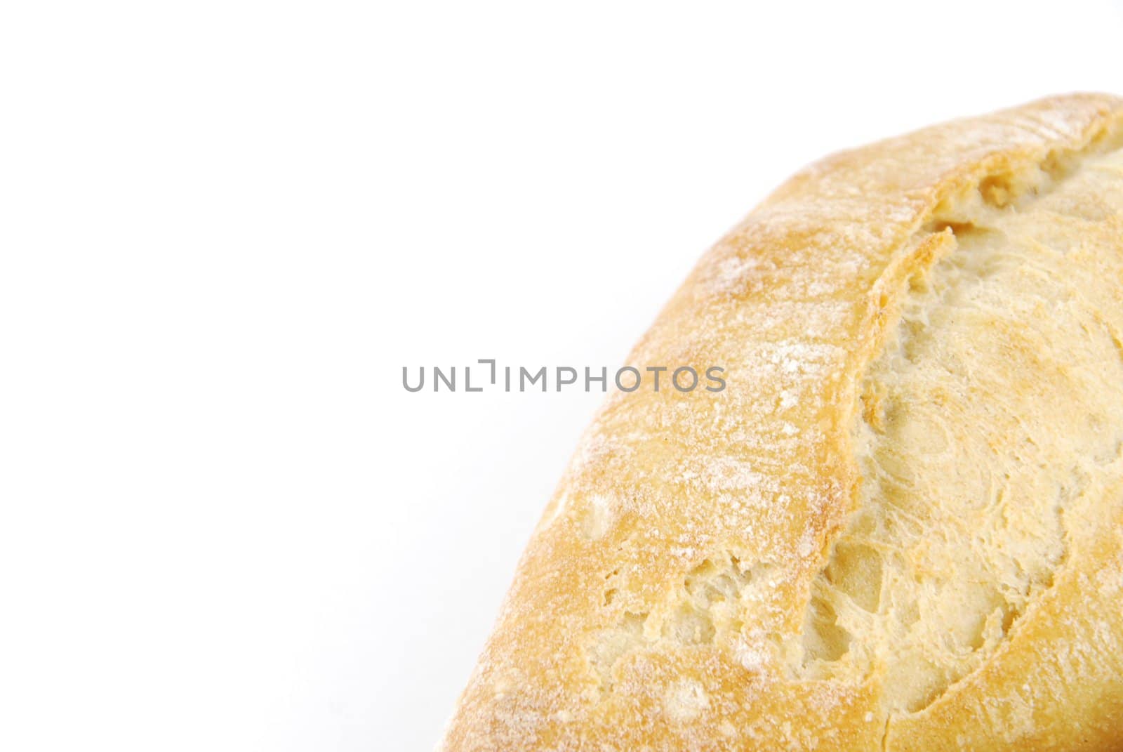 close-up of a fresh and baked white wheat bread (isolated on white background)