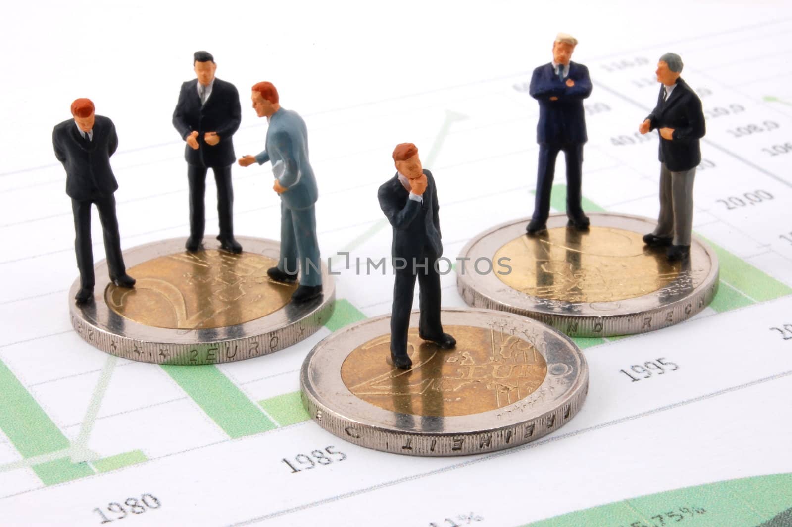 successful businessman and euro money over business chart