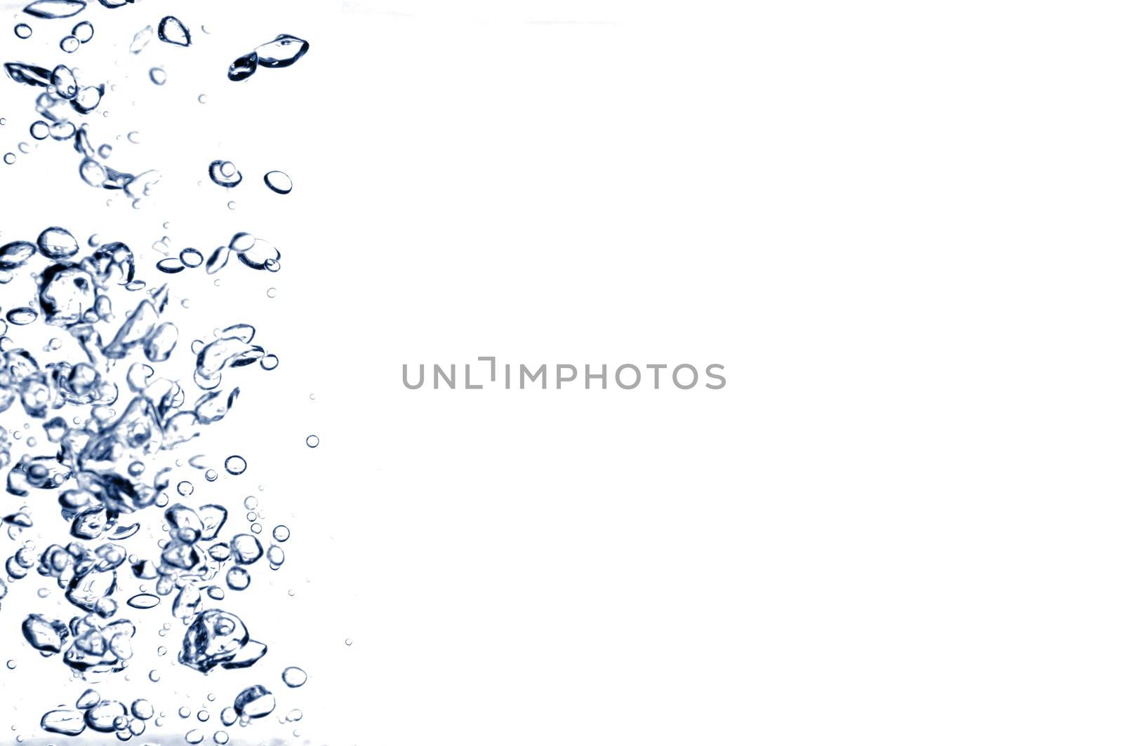 bubbles of air in water on white background