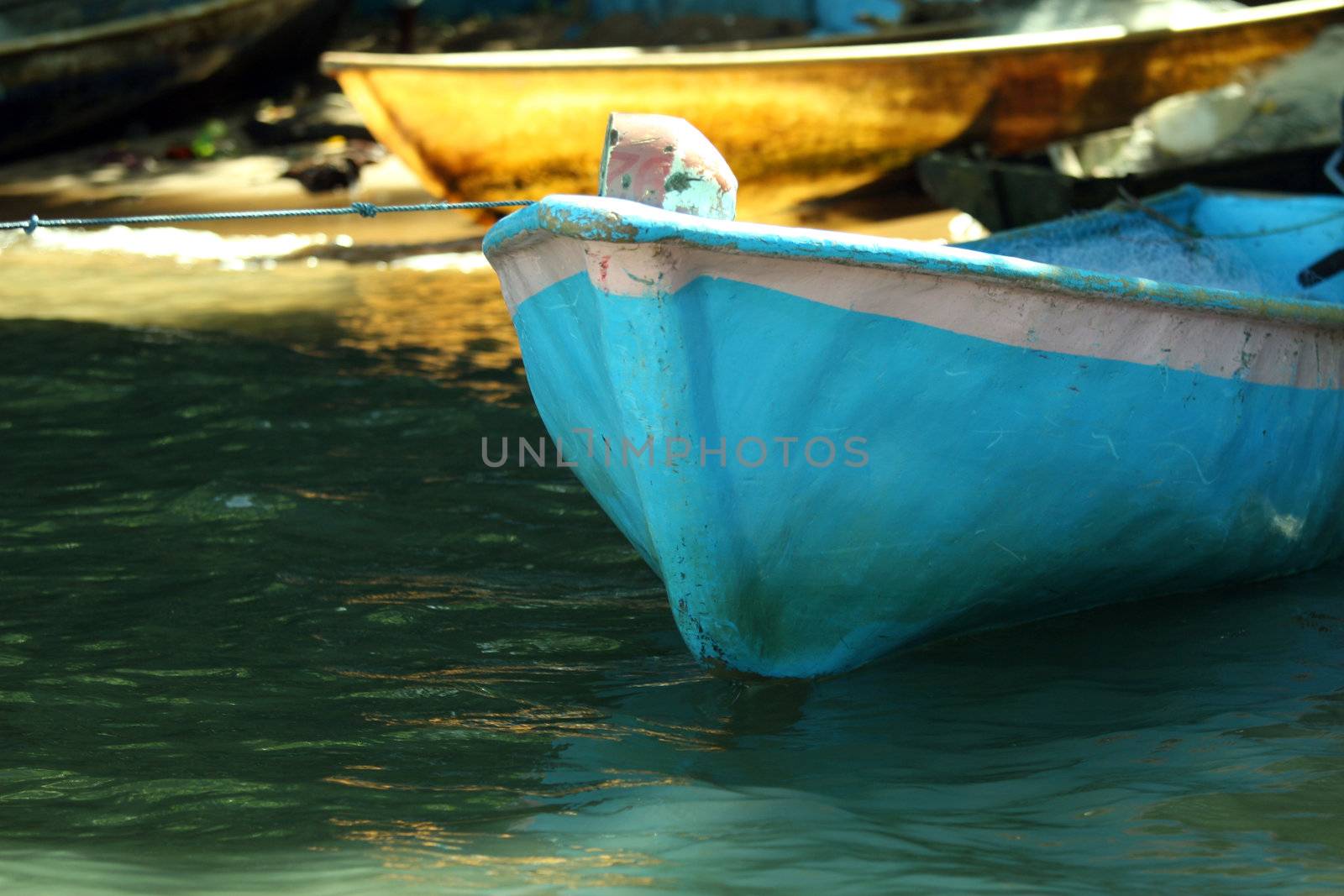 old boats on tropical beach