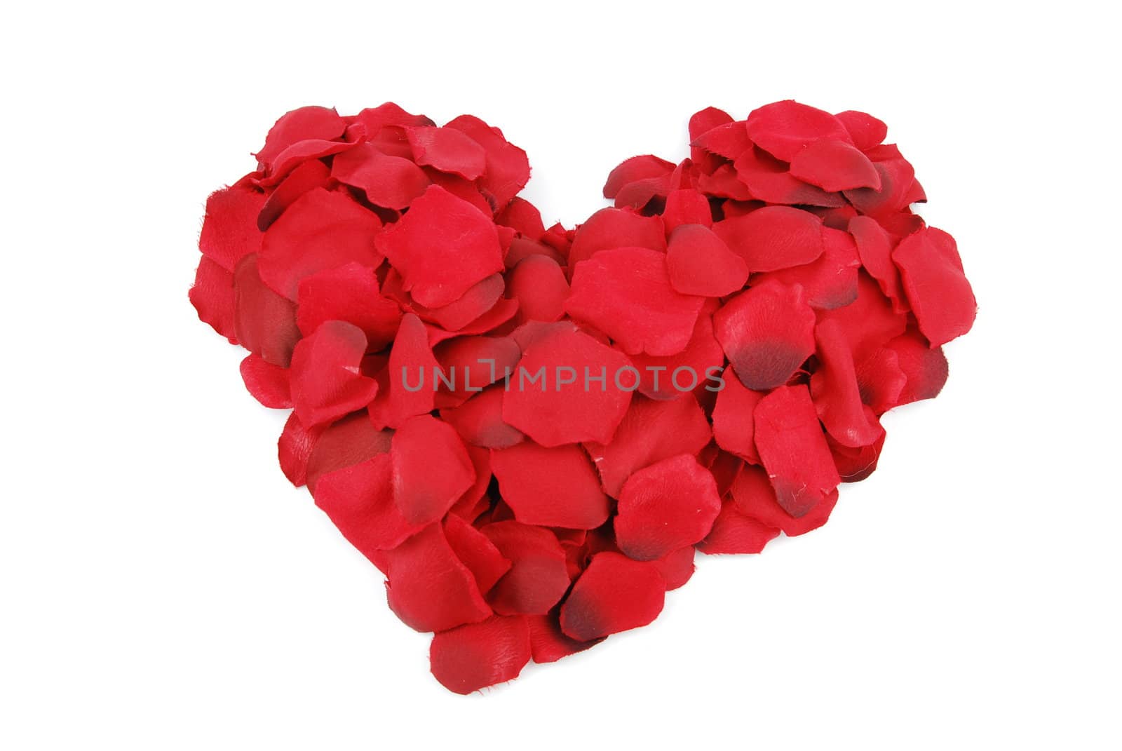 beaufiful red heart made of rose petals (isolated on white background)