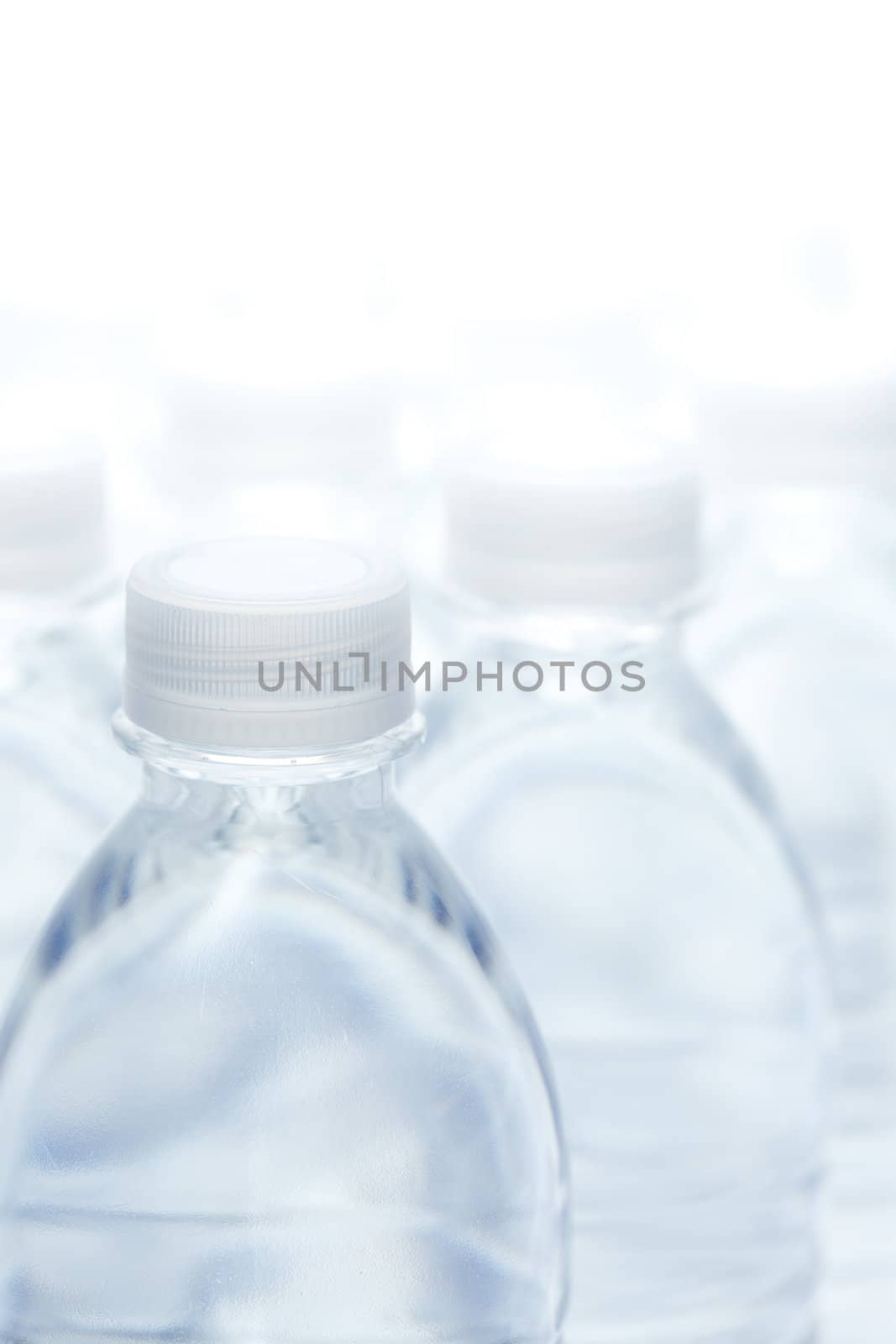 Water Bottles Abstract Image on a Gradated White Background.