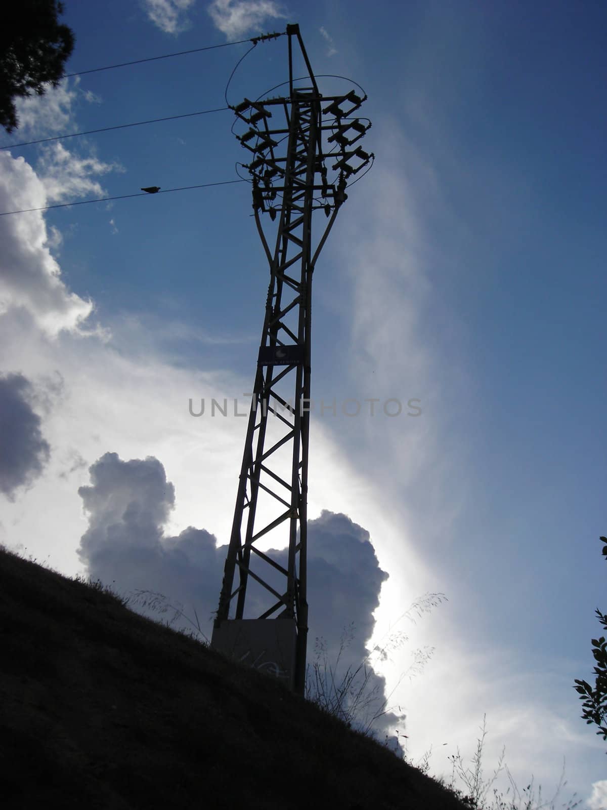 Electricity tower on a hill in the surroundings of Madrid.