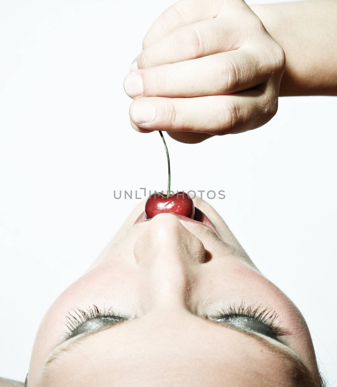 Woman Tasting A Cherry In Contrast by nfx702
