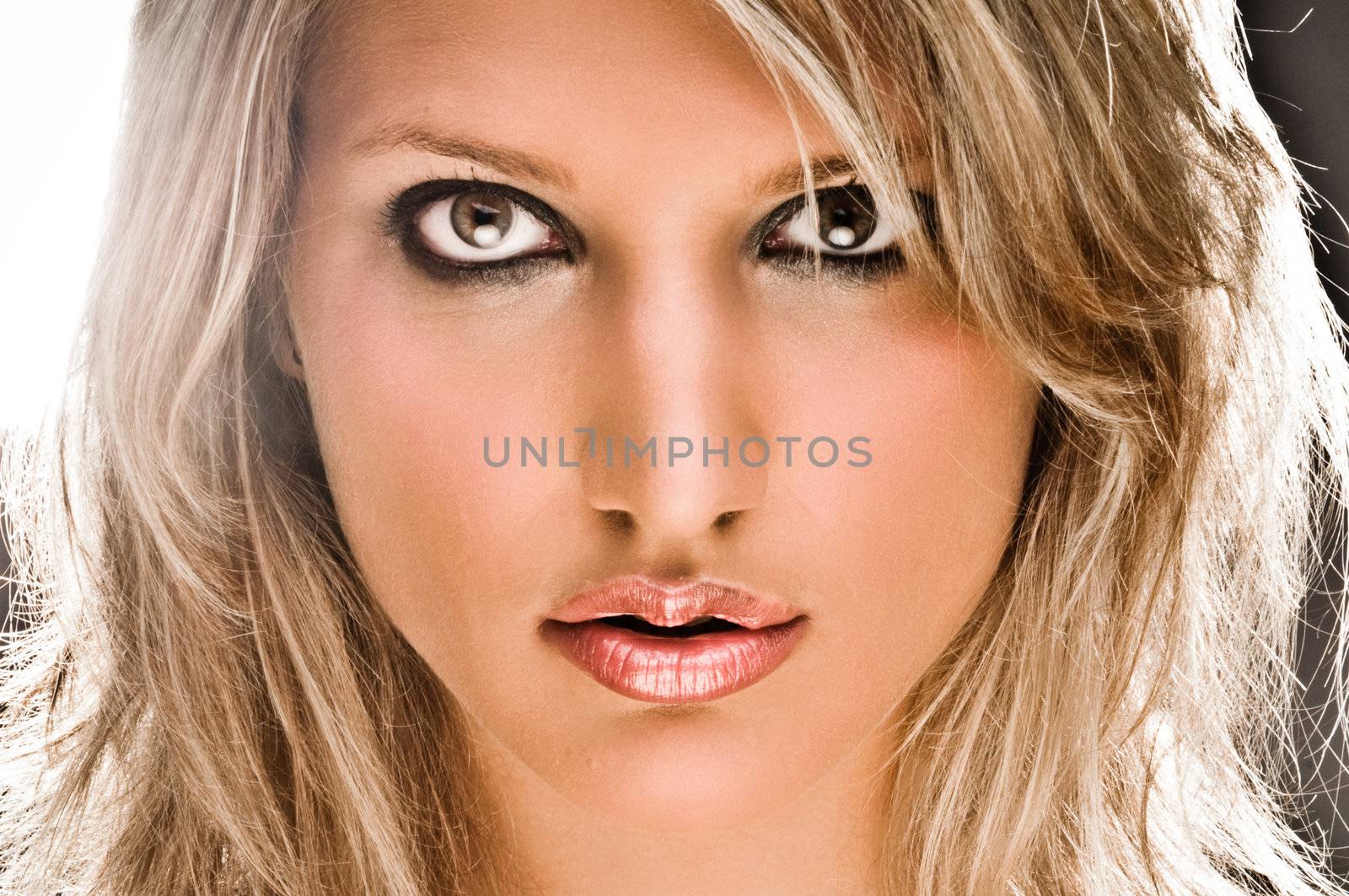 Closeup Of A Beautiful Blond Woman by nfx702