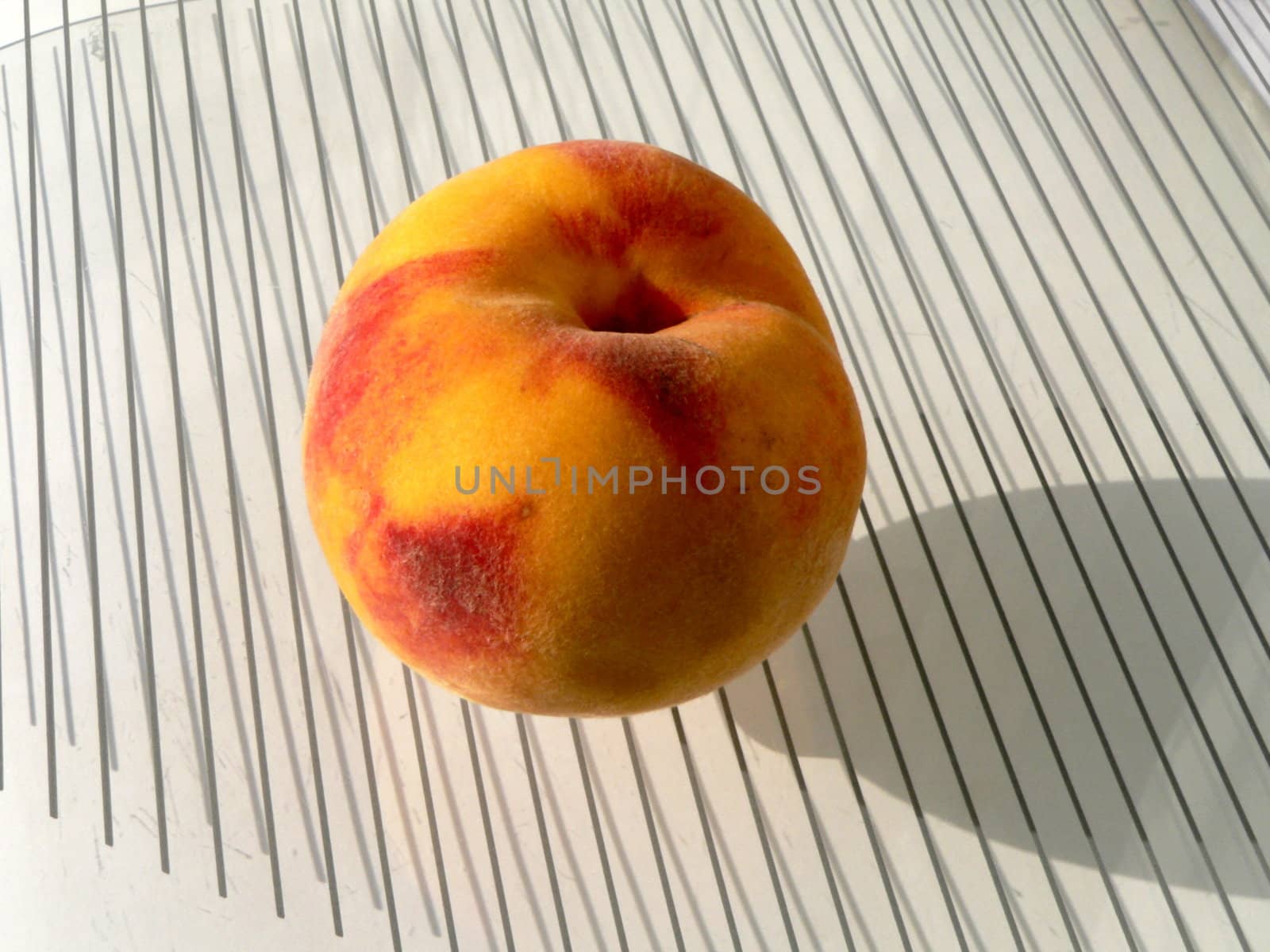 Peach on stripped background 