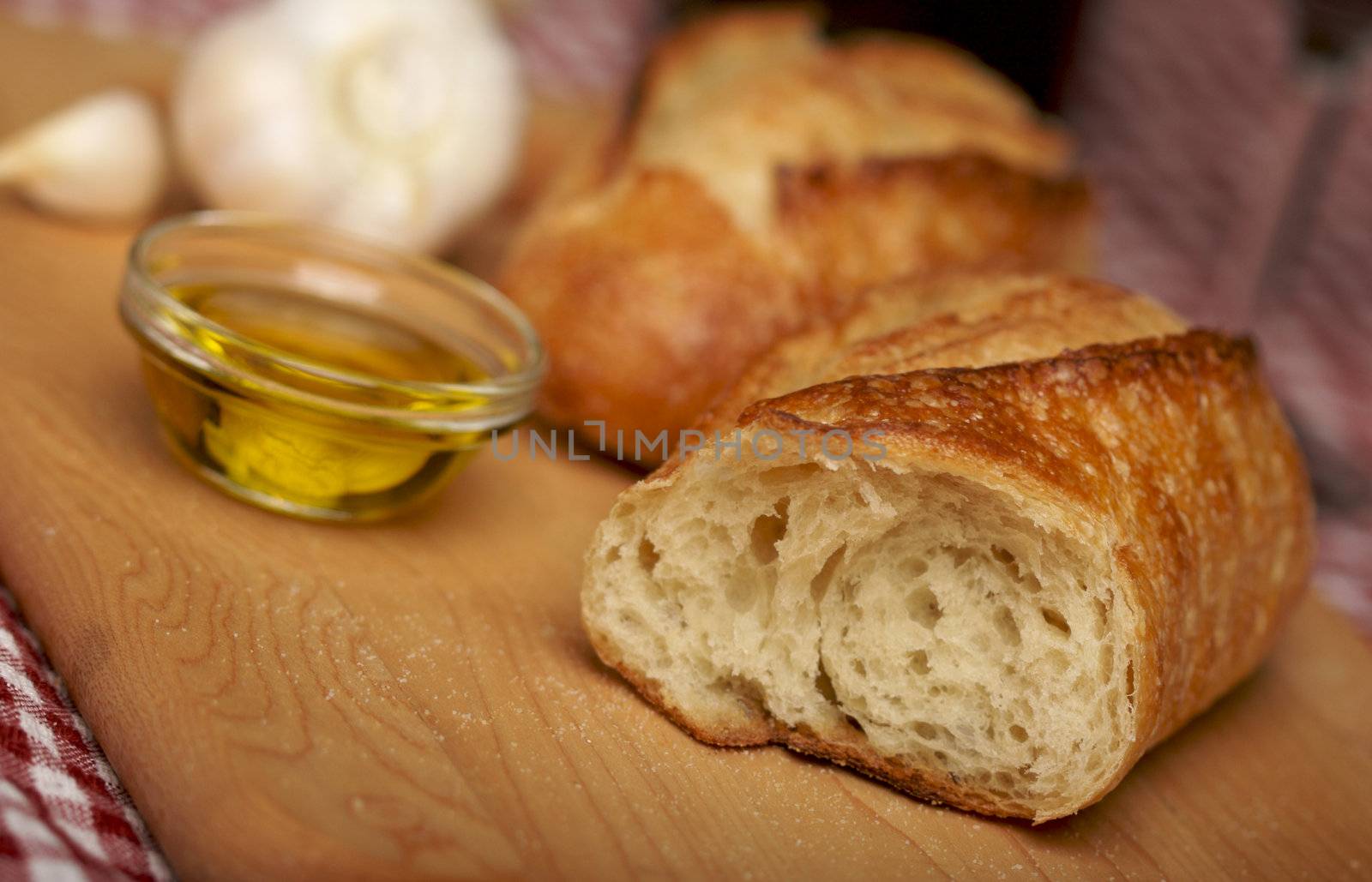 Sourdough Bread on Cutting Board by Feverpitched