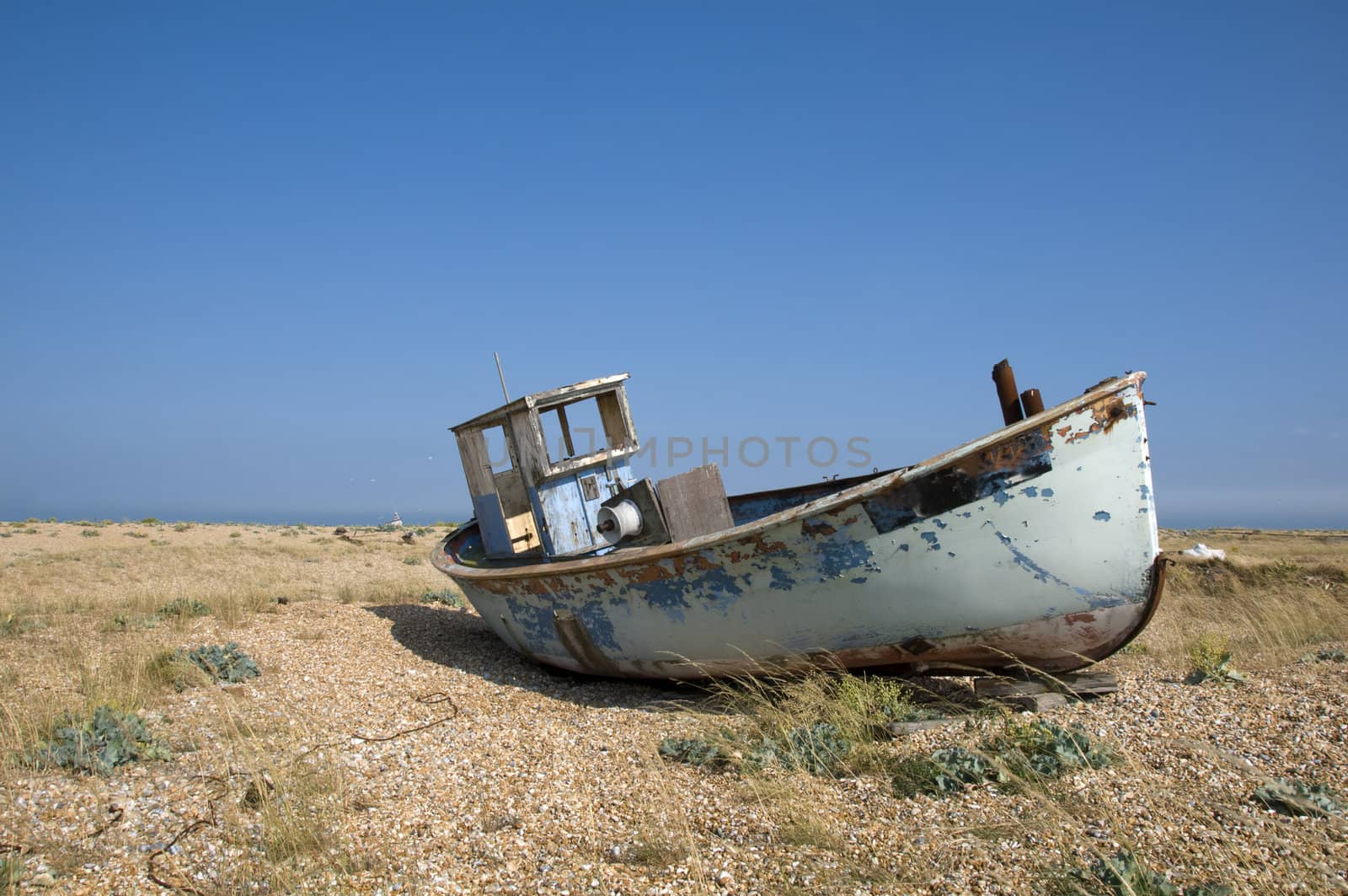 An old fishing boat on the beach at Dungeness