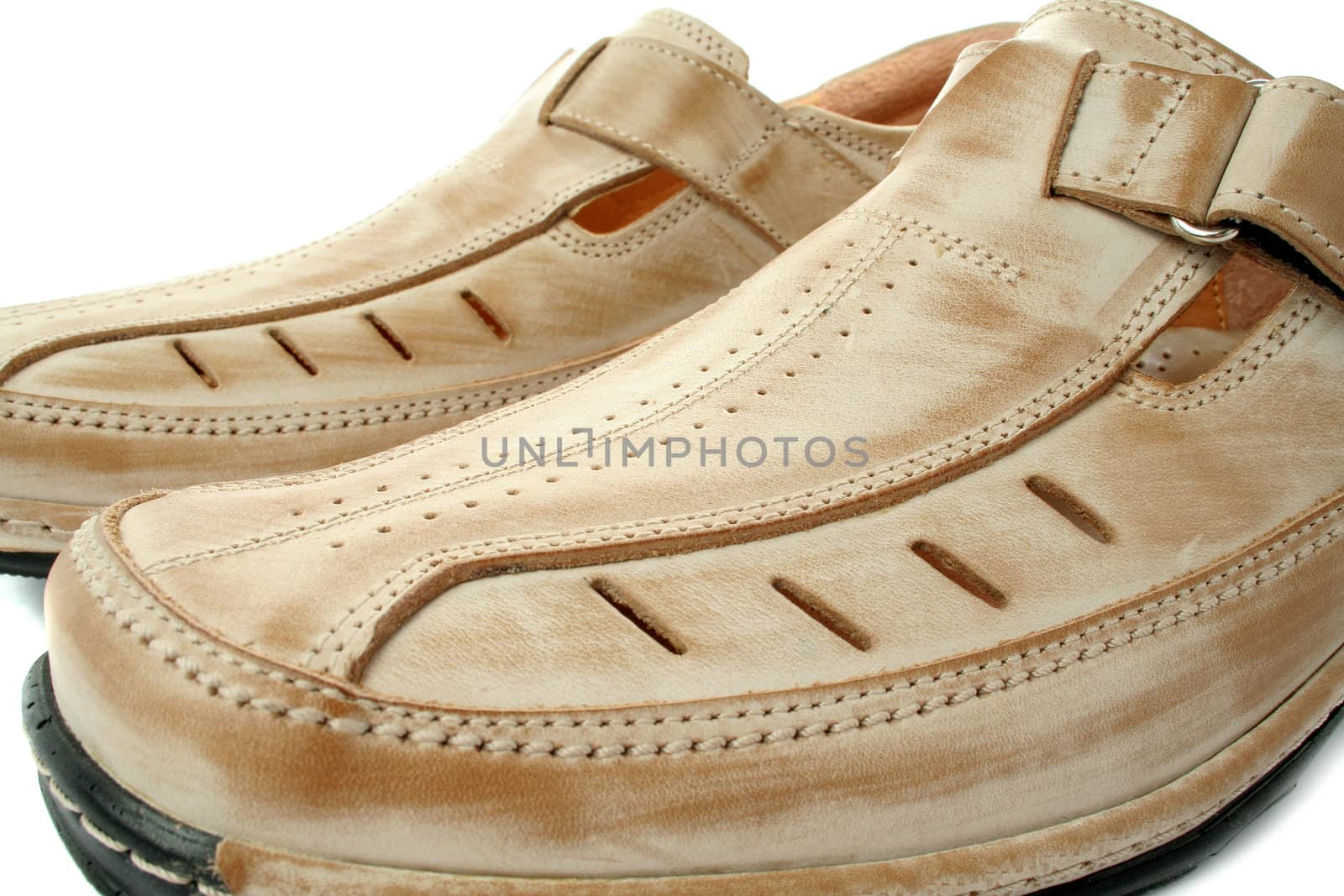 Two man's leather shoes of brown color, isolated on white, (look similar images in my portfolio)