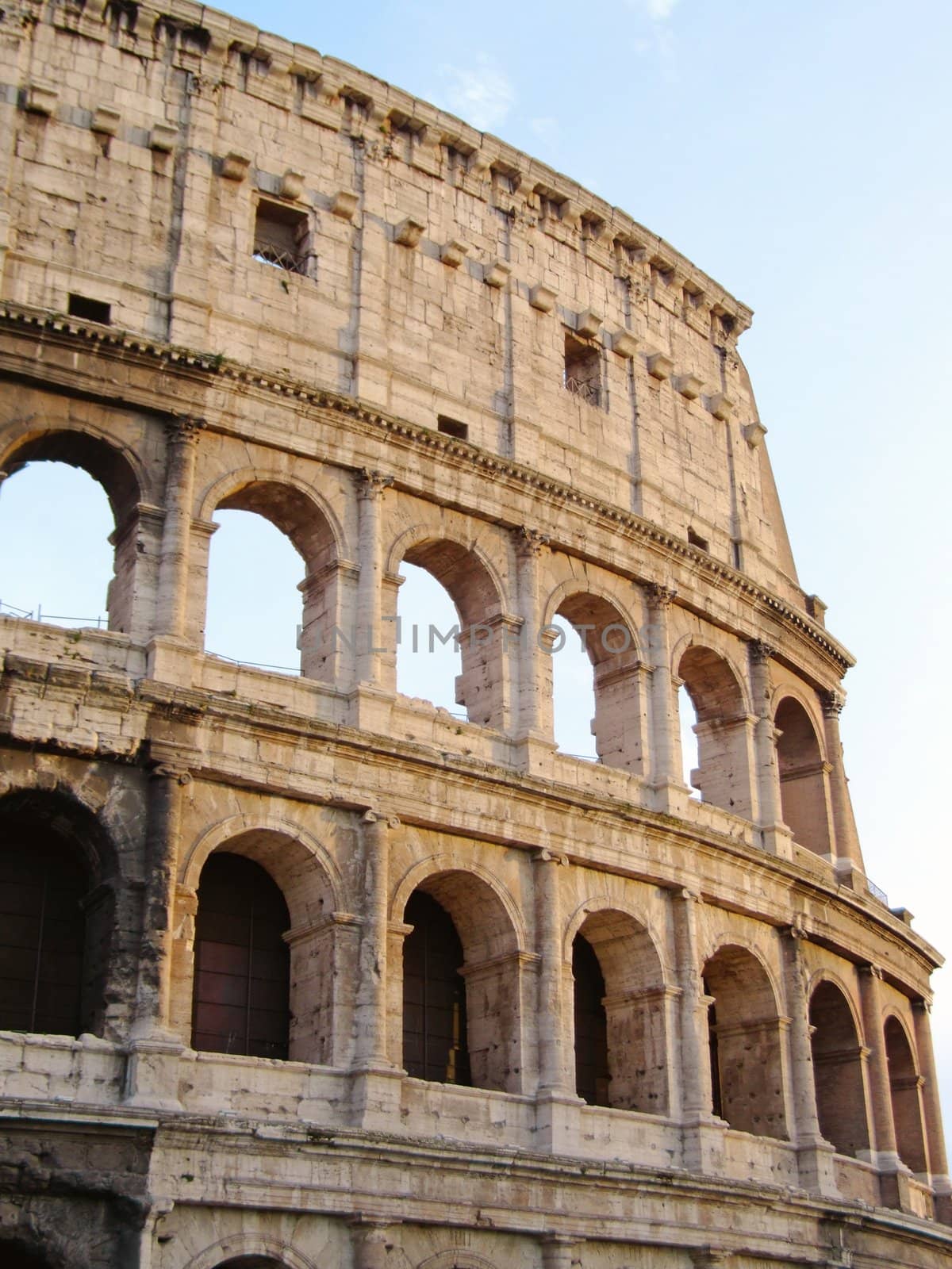 Detail of the roman colosseum in the sunset light