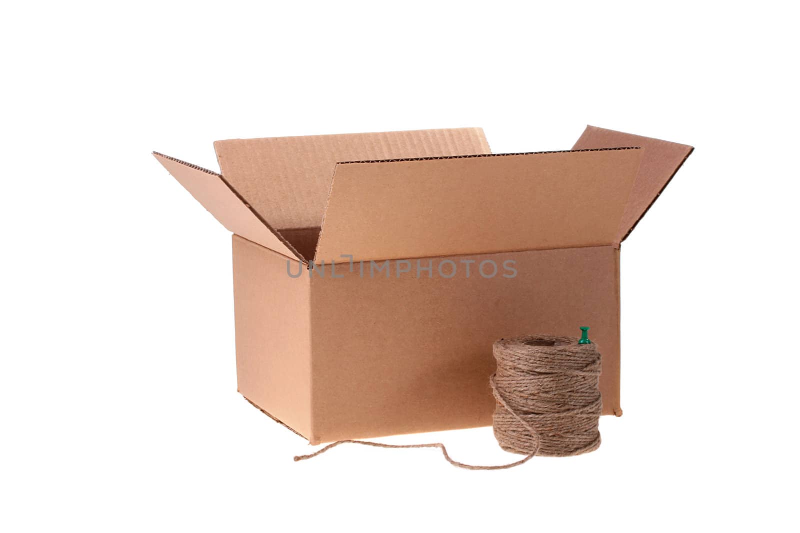 Cardboard box and cord for packing on a white background.