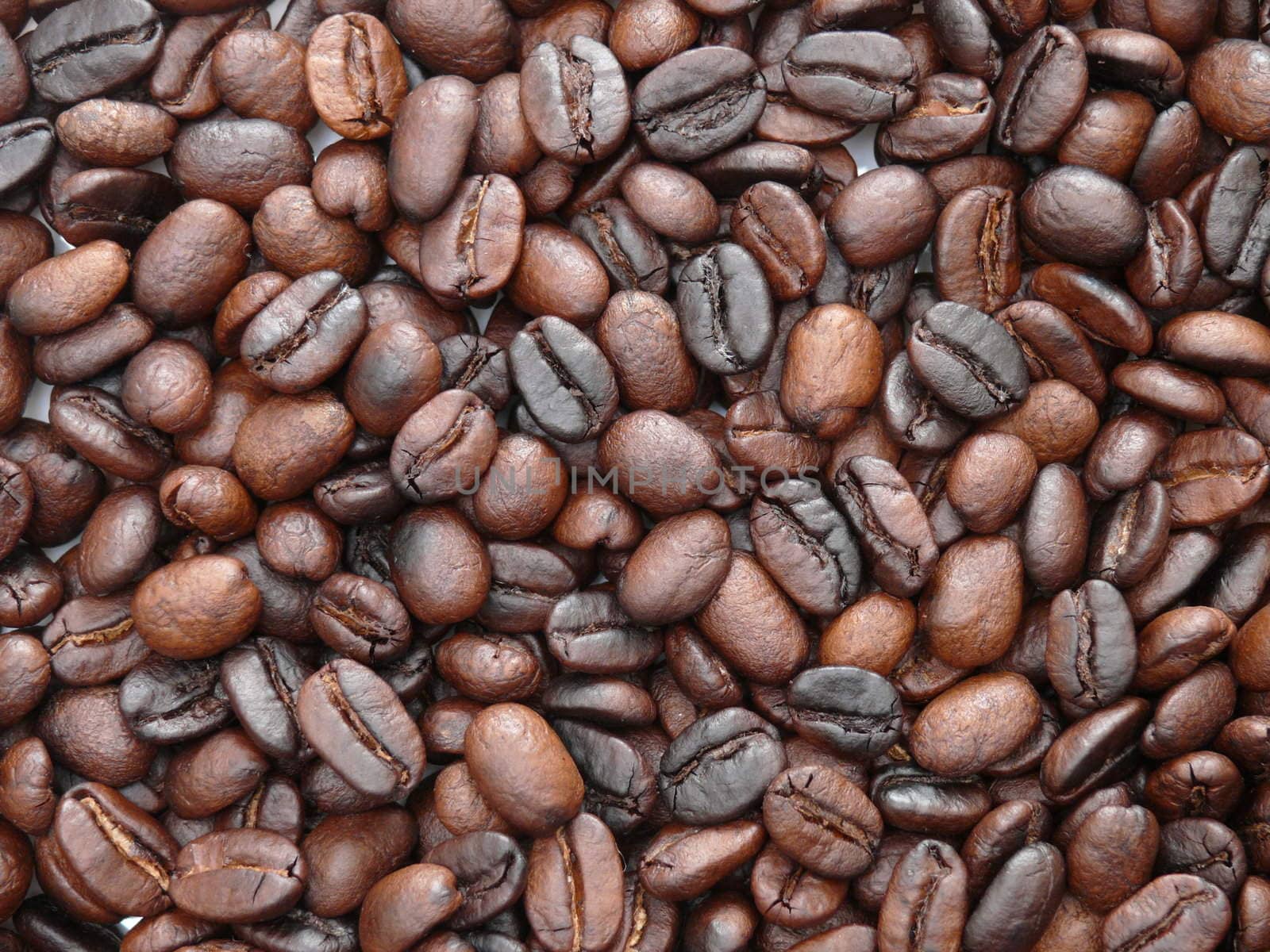 Background image of delicious freshly roasted coffee beans
