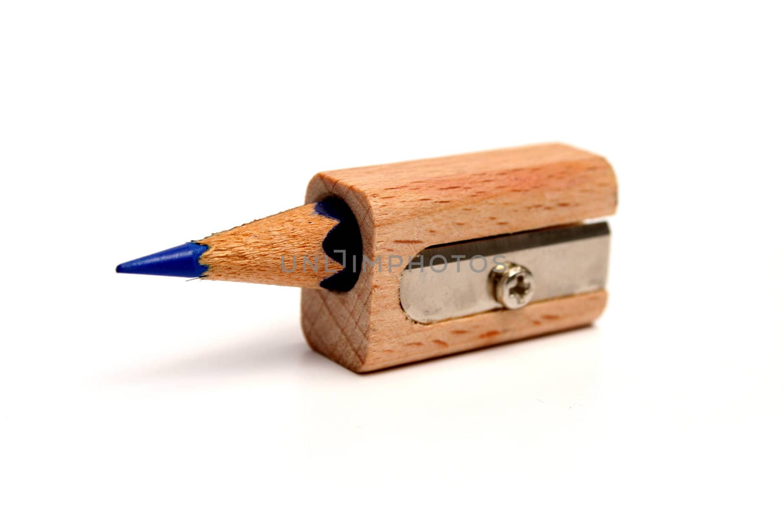 The rests of a pencil inside of a sharpener for pencils by parrus